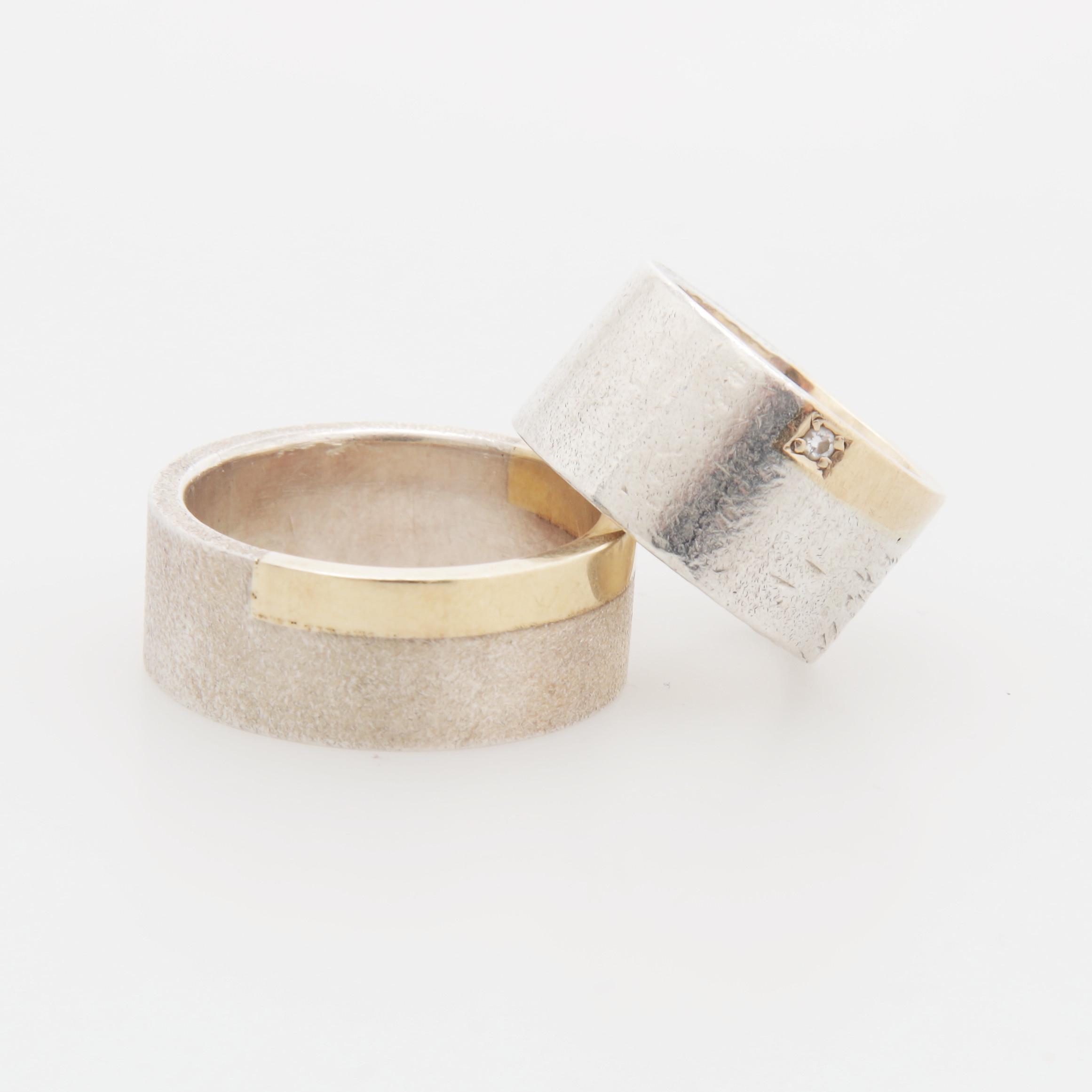 RINGAR, 2 st, silver/guld 14K, totalvikt 27,82 gram.