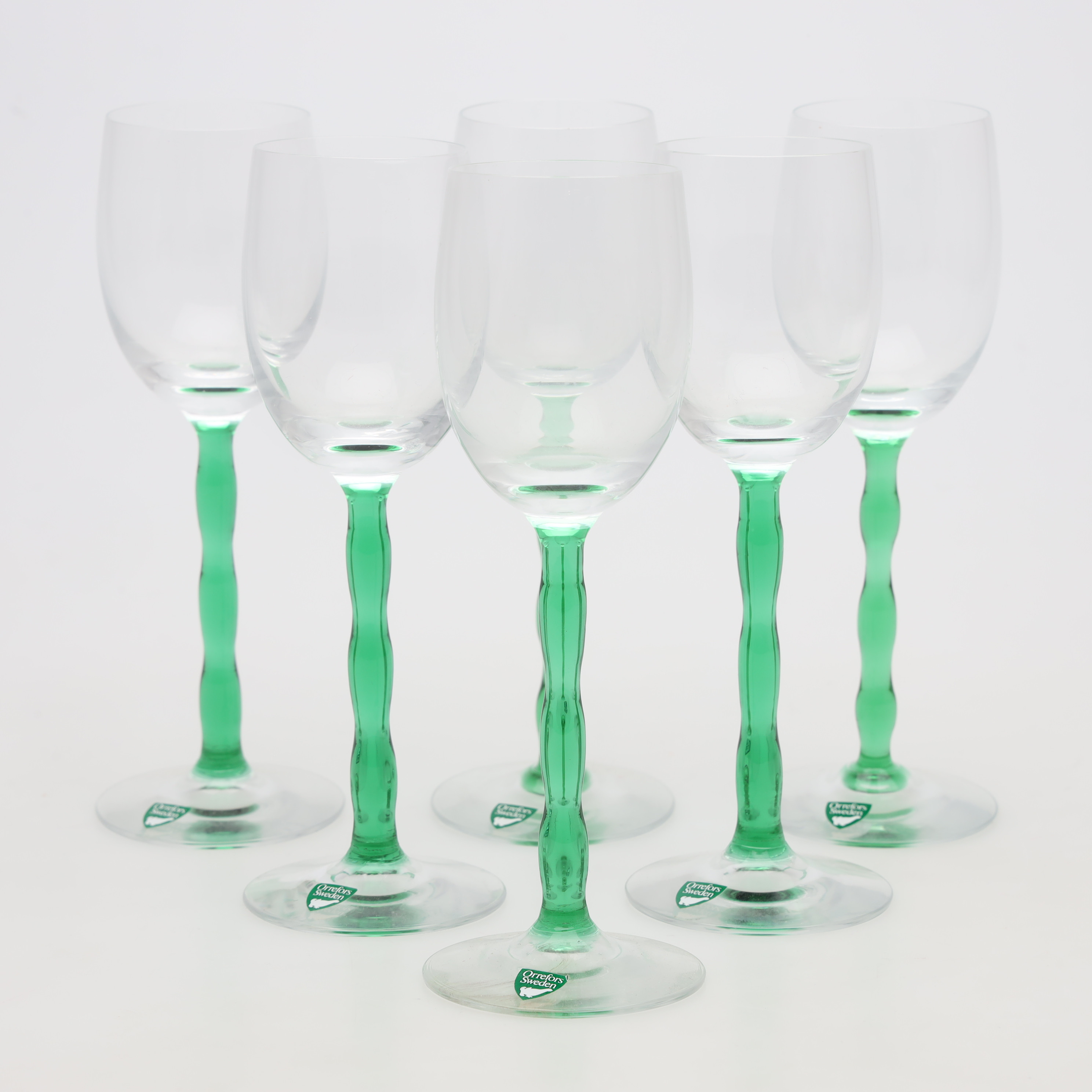 GUNNAR CYRÉN. VITVINSGLAS, 6 st, grön fot "Nobel", Orrefors.