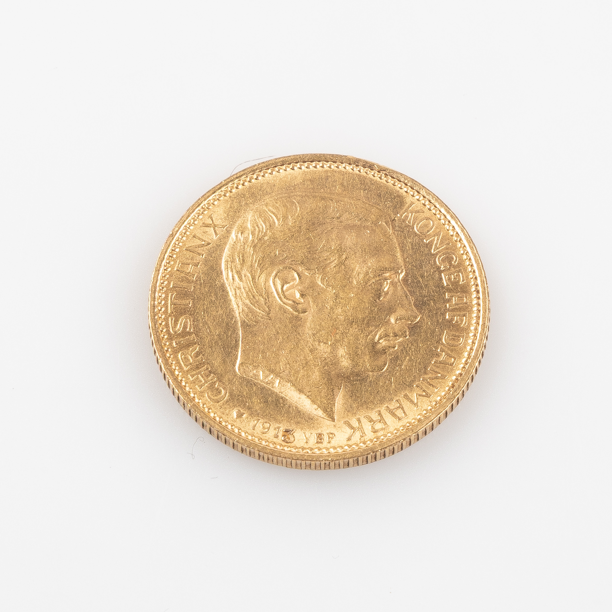 MYNT, 21,6 k guld, 20 kroner, Christian X, Konge af Danmark, 1913, gravör Andreas Frederik Vilhelm Hansen (AH), myntmästare Vilhelm Buchard Poulsen (VBP).
