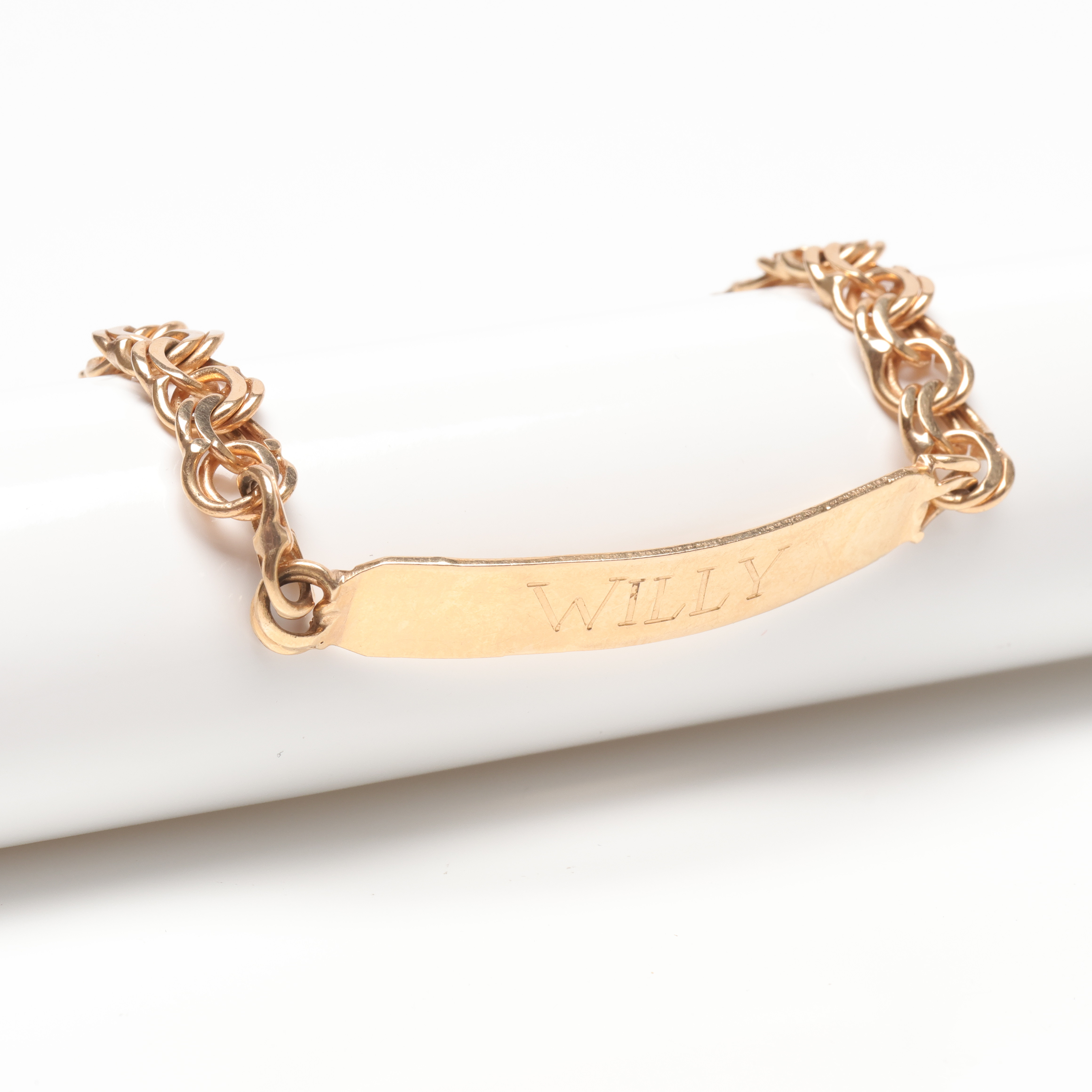 ARMBAND med BRICKA, 18k guld, vitk ca 18 g.