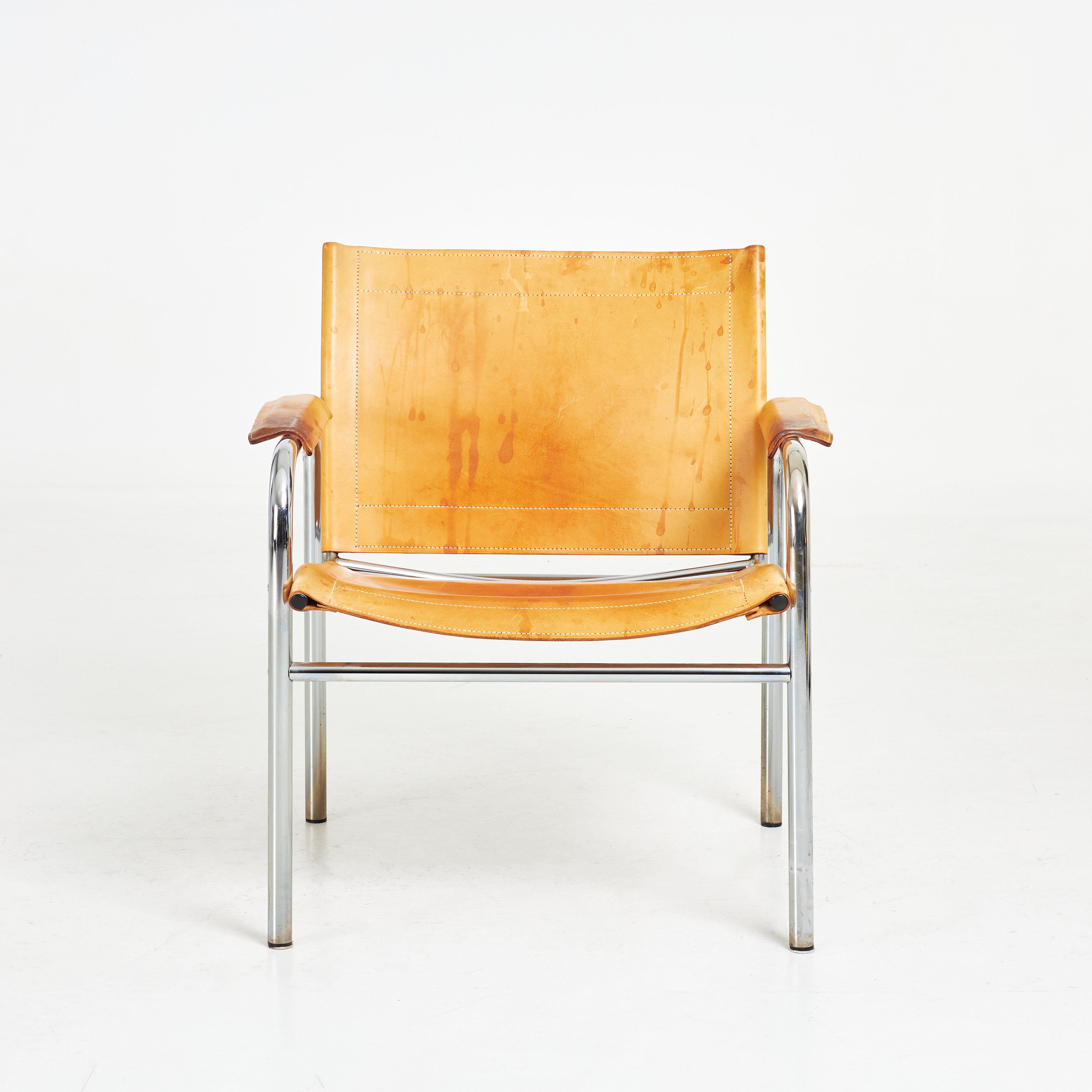 TORD BJÖRKLUND. "Klinte", fåtölj, IKEA, kromad benställning, cognacsfärgat läder, under med linnecanvas.