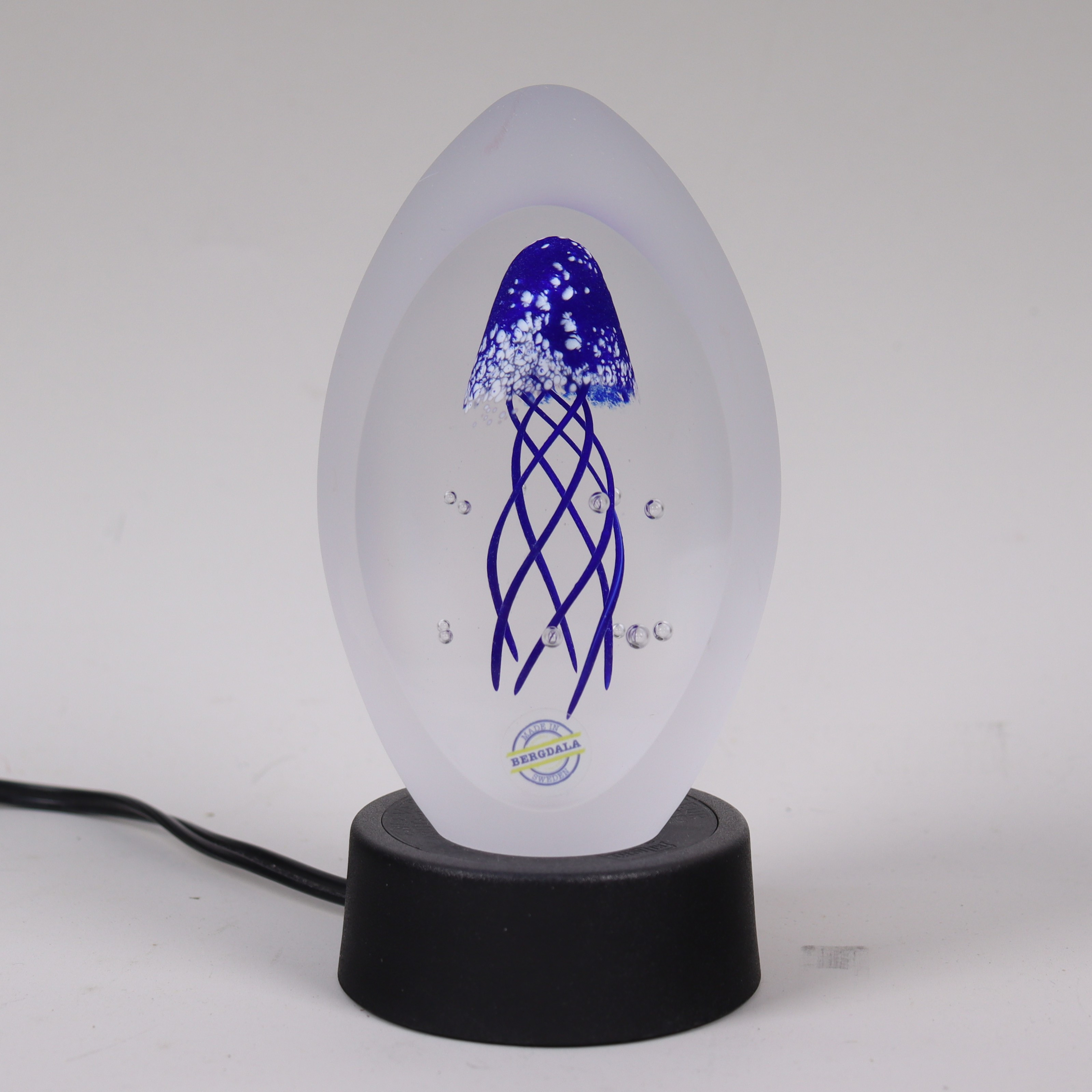 BREVPRESS, Bergdala, glas med manet.