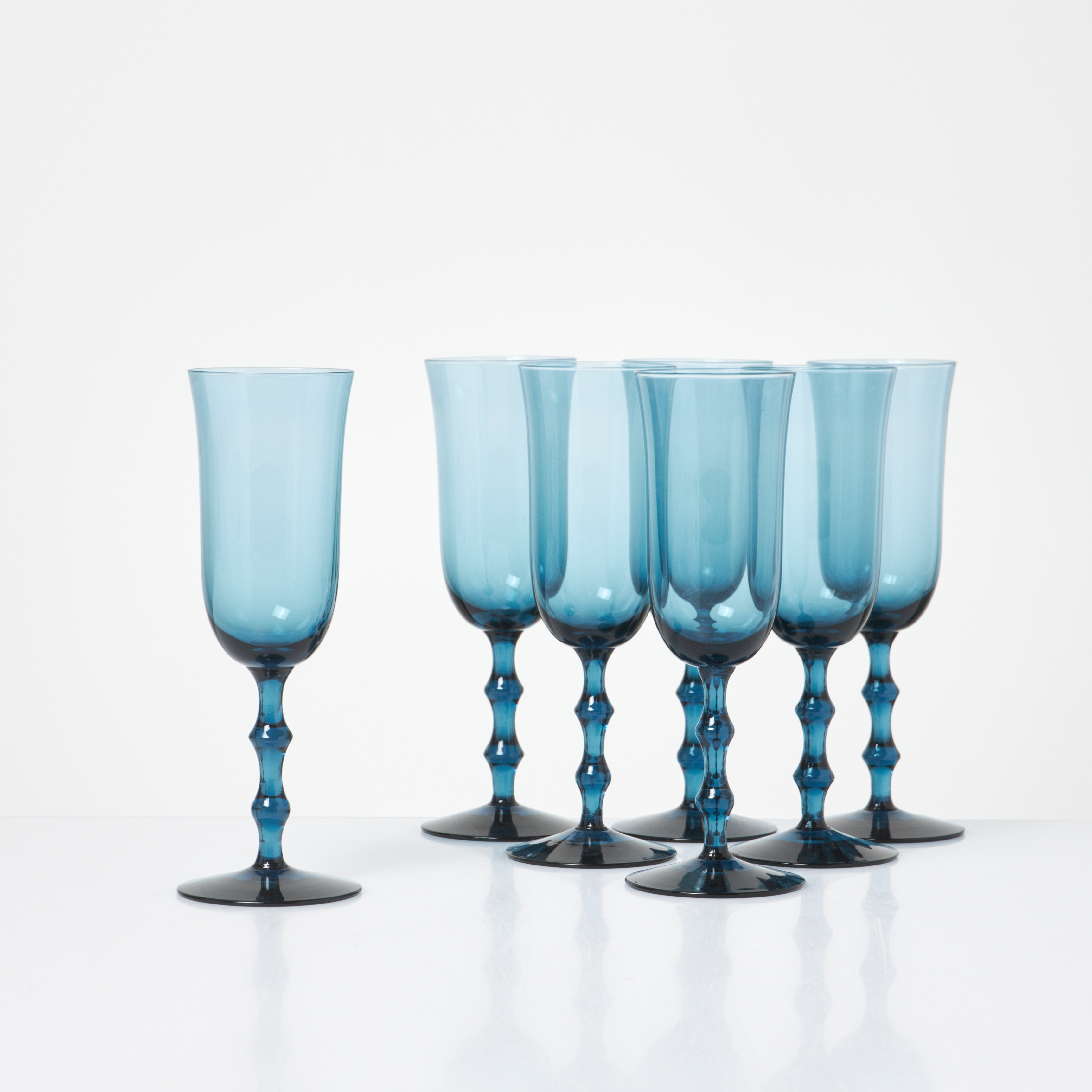 SIMON GATE. champagneglas, 7 st, "Salut", Orrefors, blåtonad glasmassa.