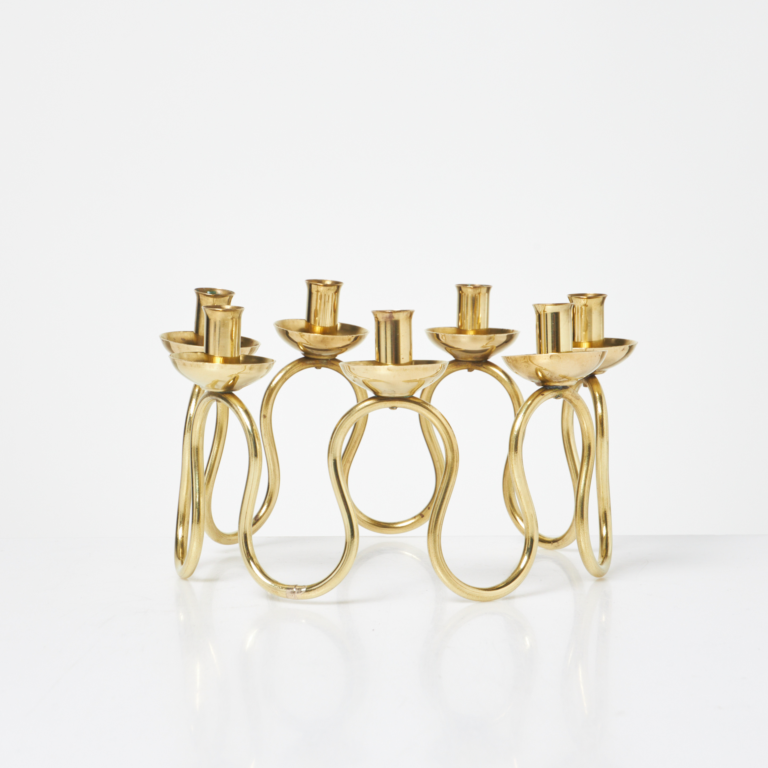 LARS HOLMSTRÖM. ljusstake, mässing, för Firma Svenskt Tenn.