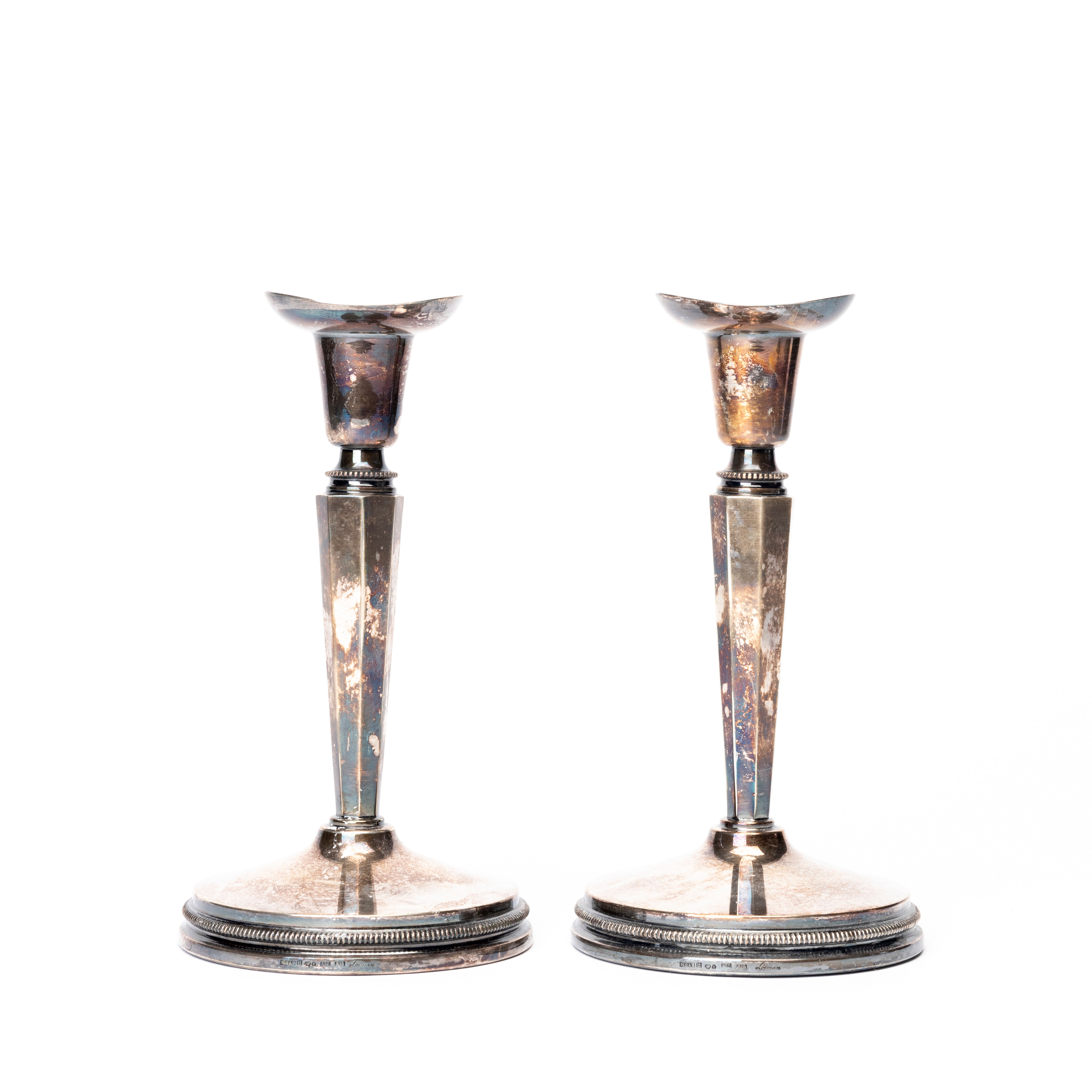 ERIC LÖFMAN. Ljusstakar, ett par, silver, MGAB, Uppsala, 1976, signerade.