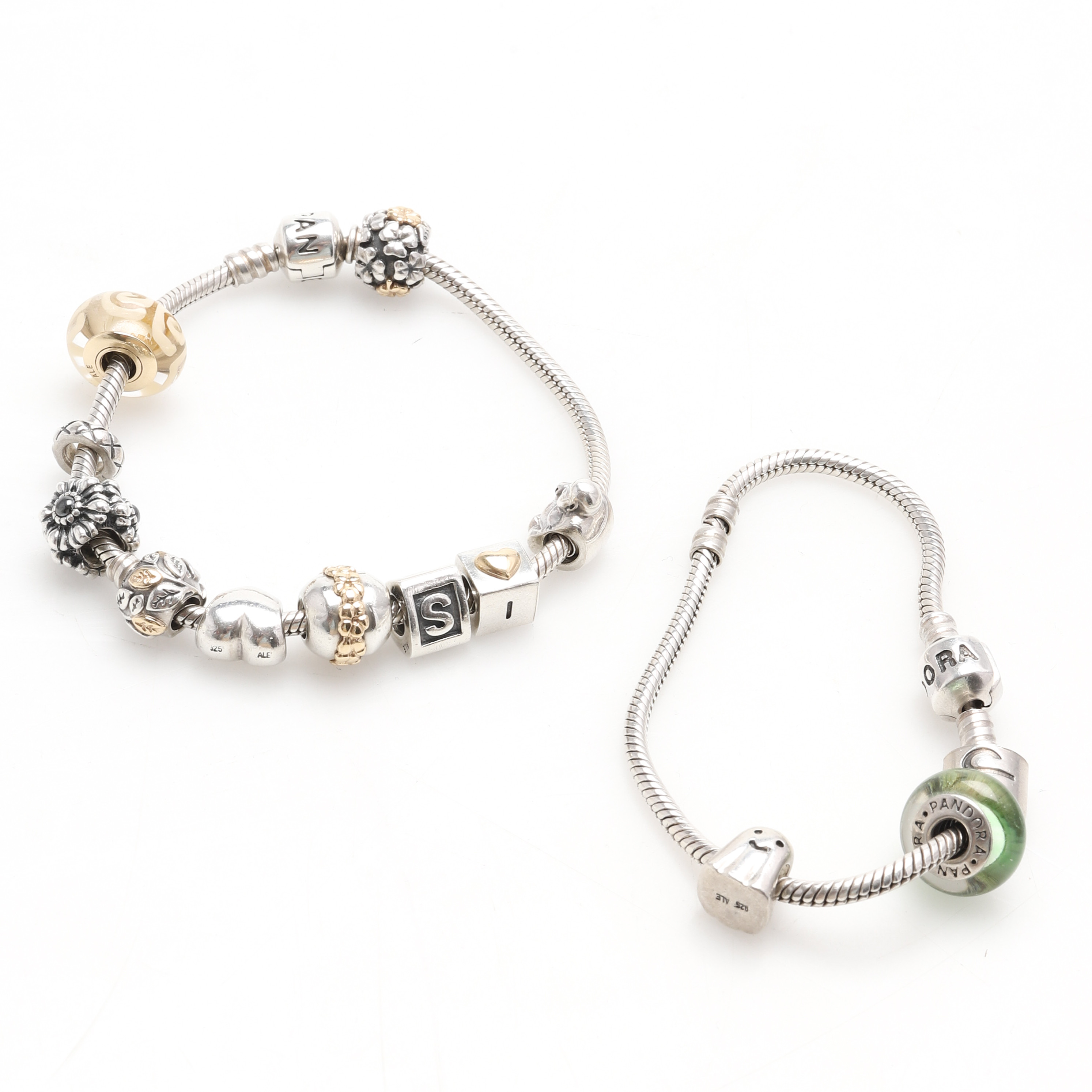 PANDORA, armband, 2 st med 13 st berlocker, silver och gulddetaljer i 14k guld.