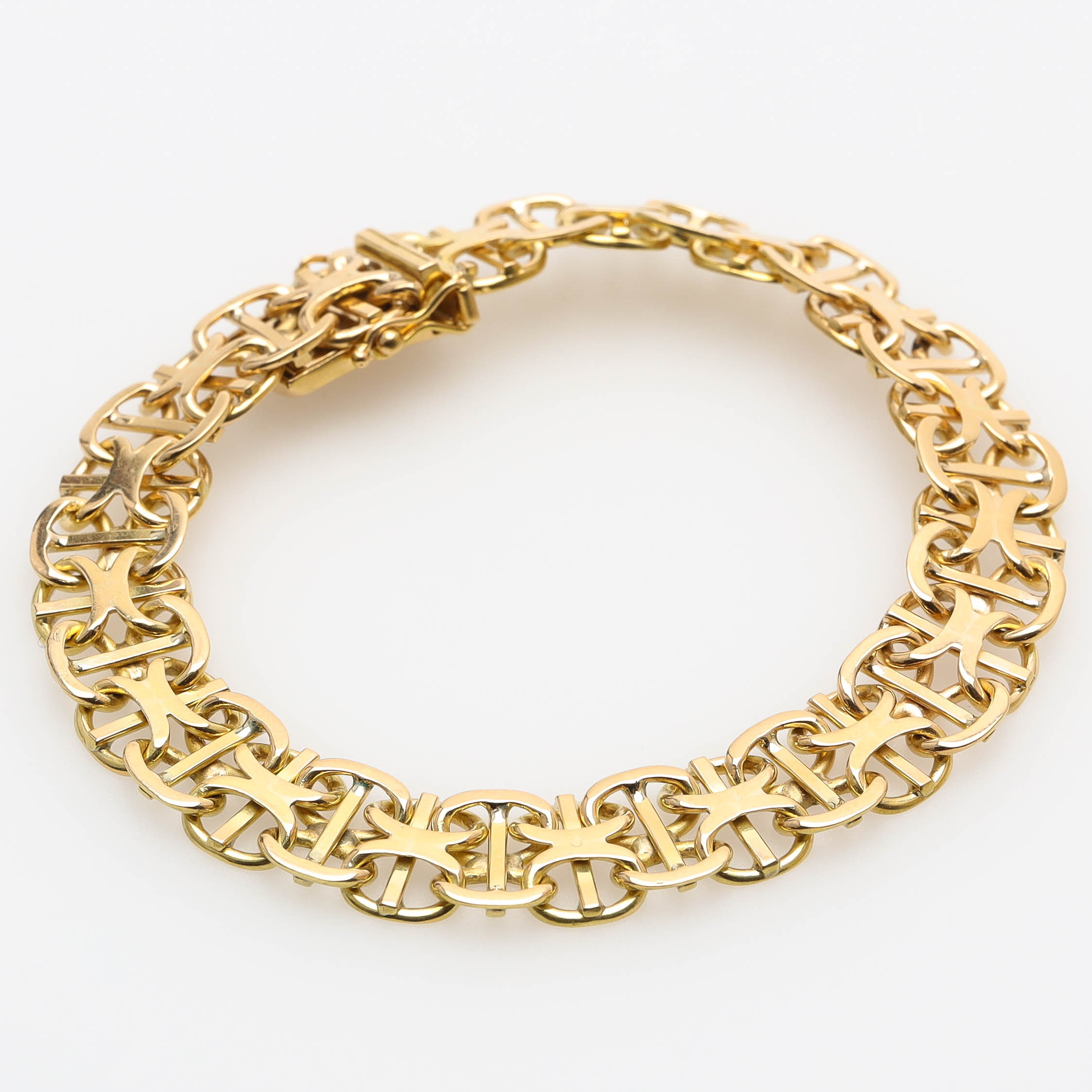 ARMBAND, 18 k guld, x-länk med stav, Stockholm 1964.