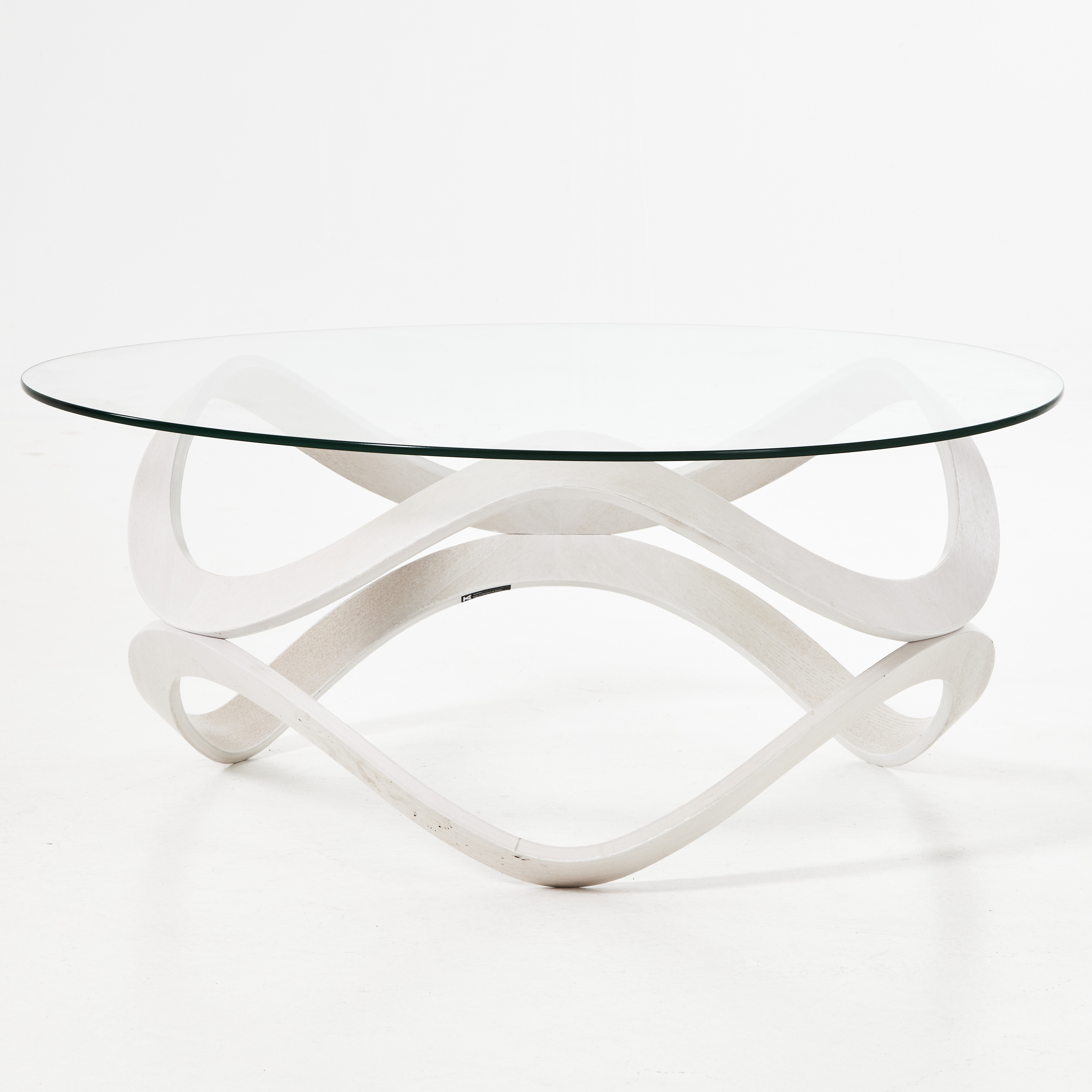 STAFFAN HOLM & DAN SUNAGA. Bord, "Newton", skiva i glas, underrede i trä, Karl Andersson & Söner, etikettmärkt, formgivningsår 2009.