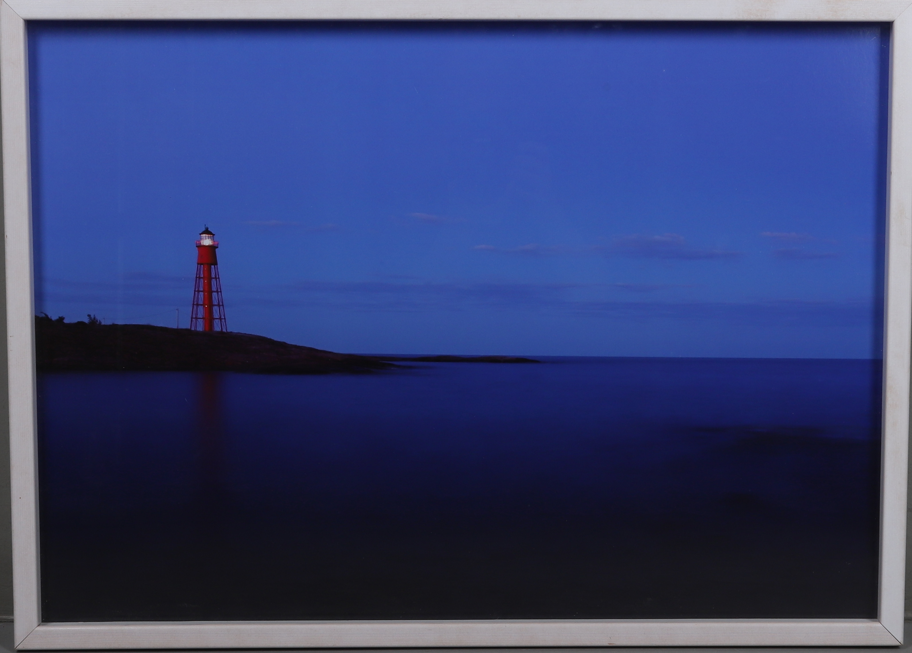 DANIEL SÖDERHOLM. Fotografi, fyr vid havet.