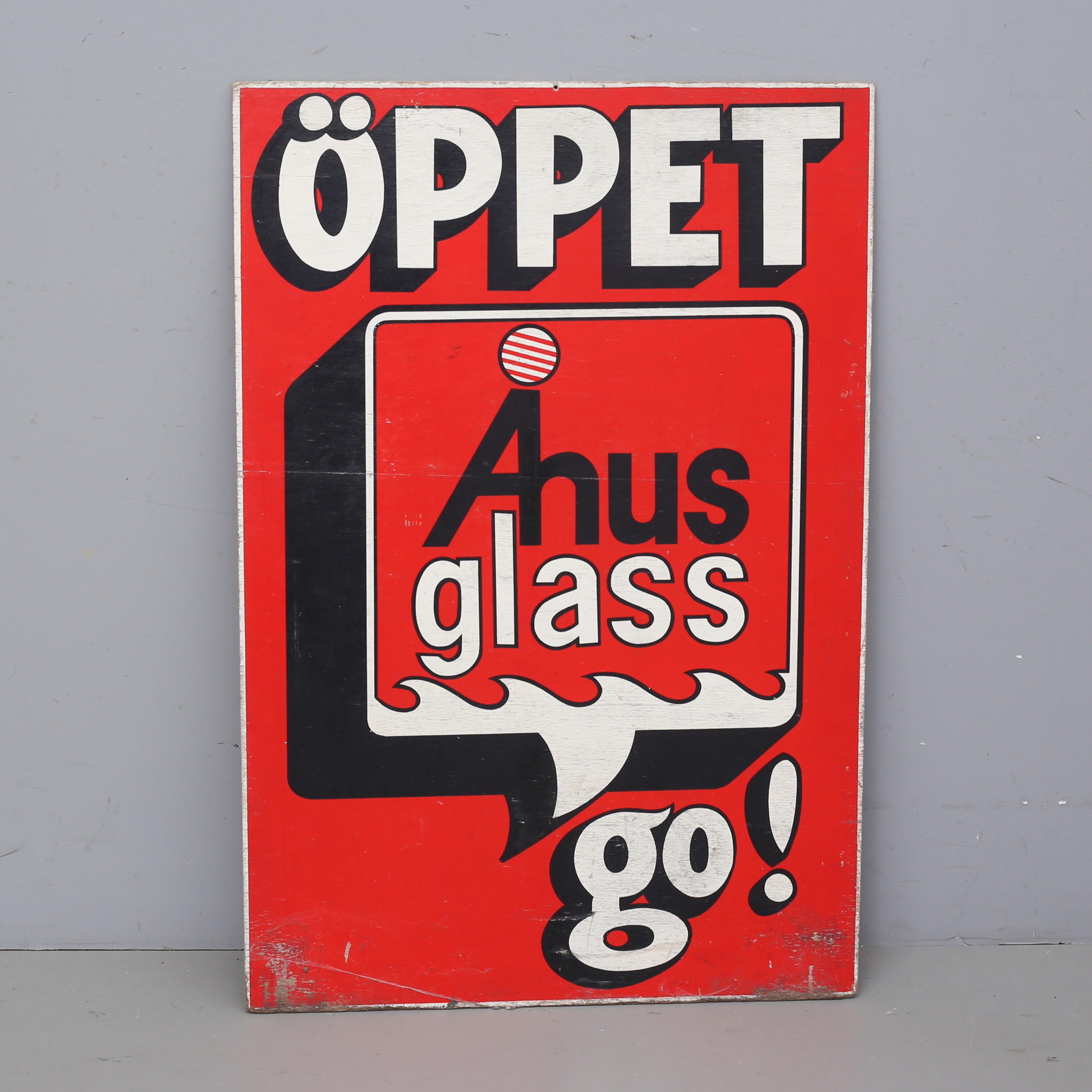 RELAMSKYLT, träfanér, Åhus glass.