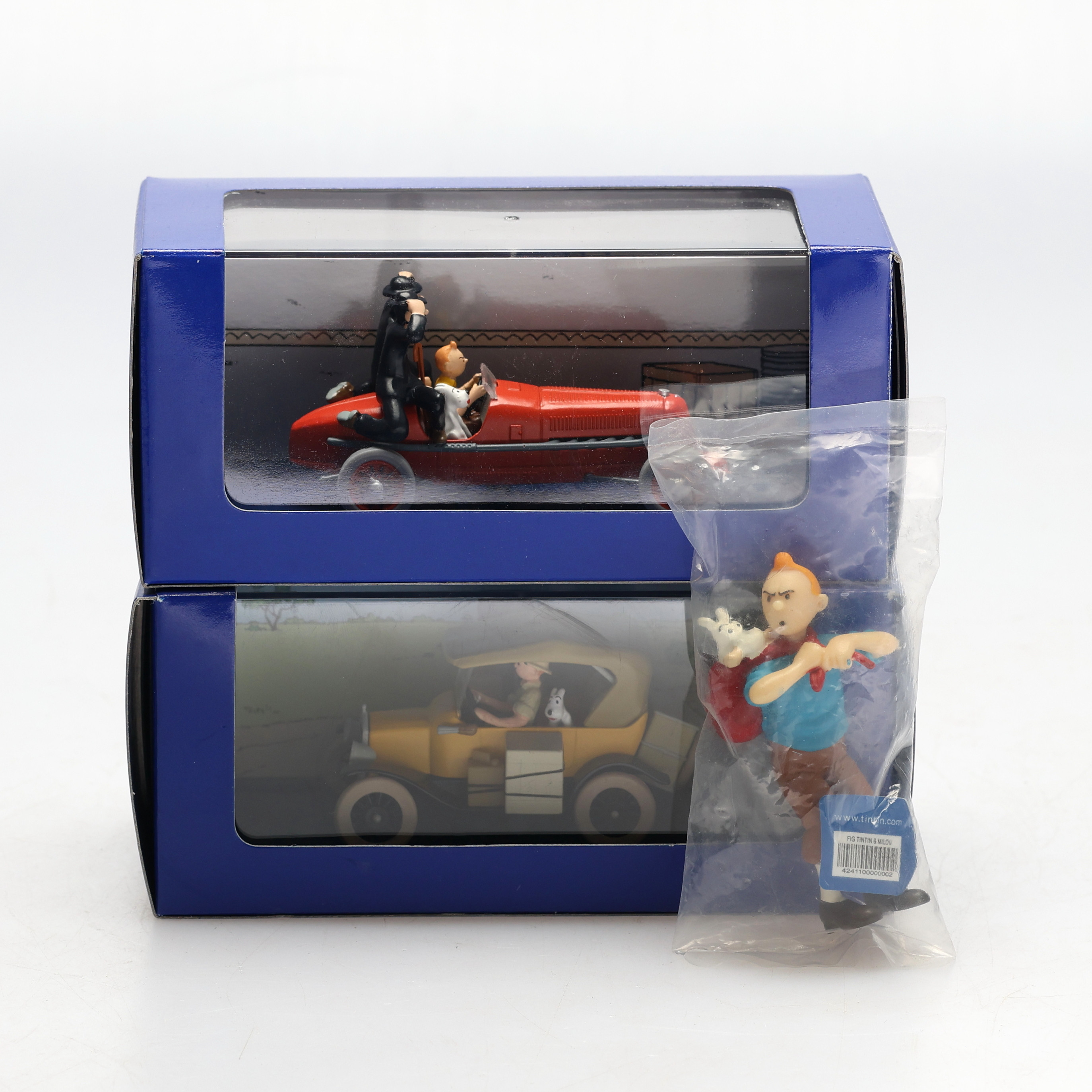 SAMLARBILAR, 2 st, Tintin, och en figur.