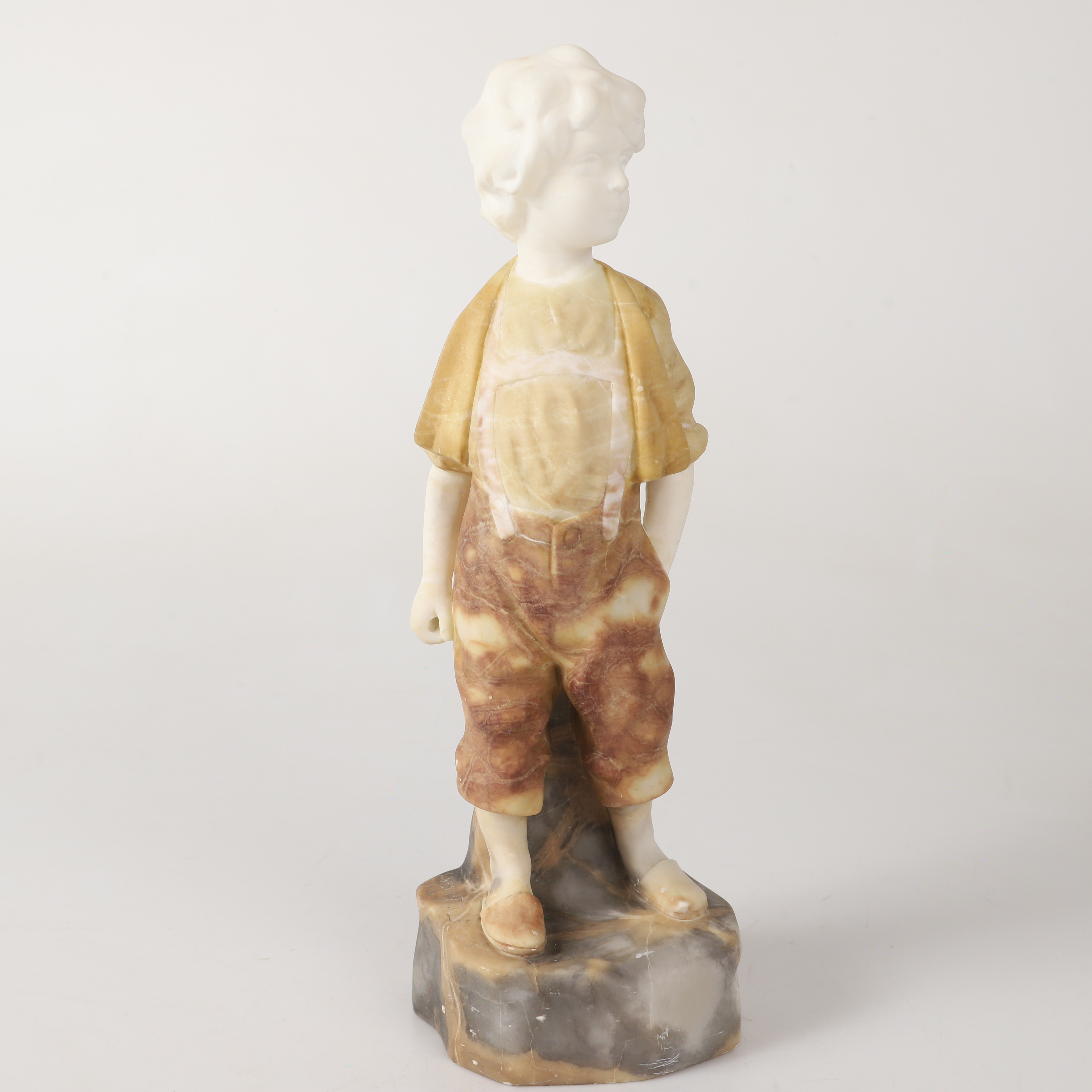 JULIUS PAUL SCHMIDT-FELLING. EFTER. Figurin, pojke, alabaster, signerad.