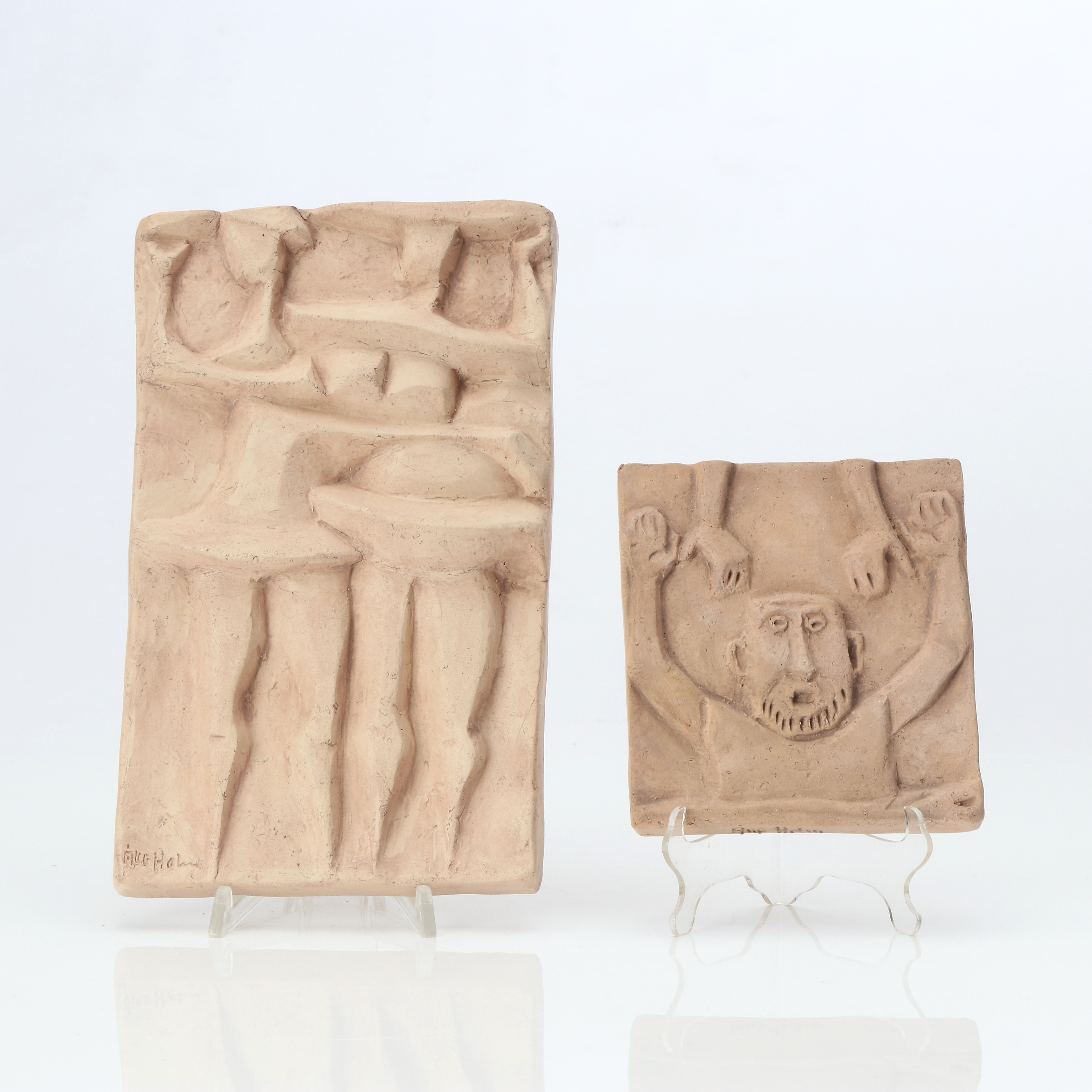 ÅKE HOLM. VÄGGRELIEFER, TVÅ ST. Terracotta. Figurmotiv. Signerade.