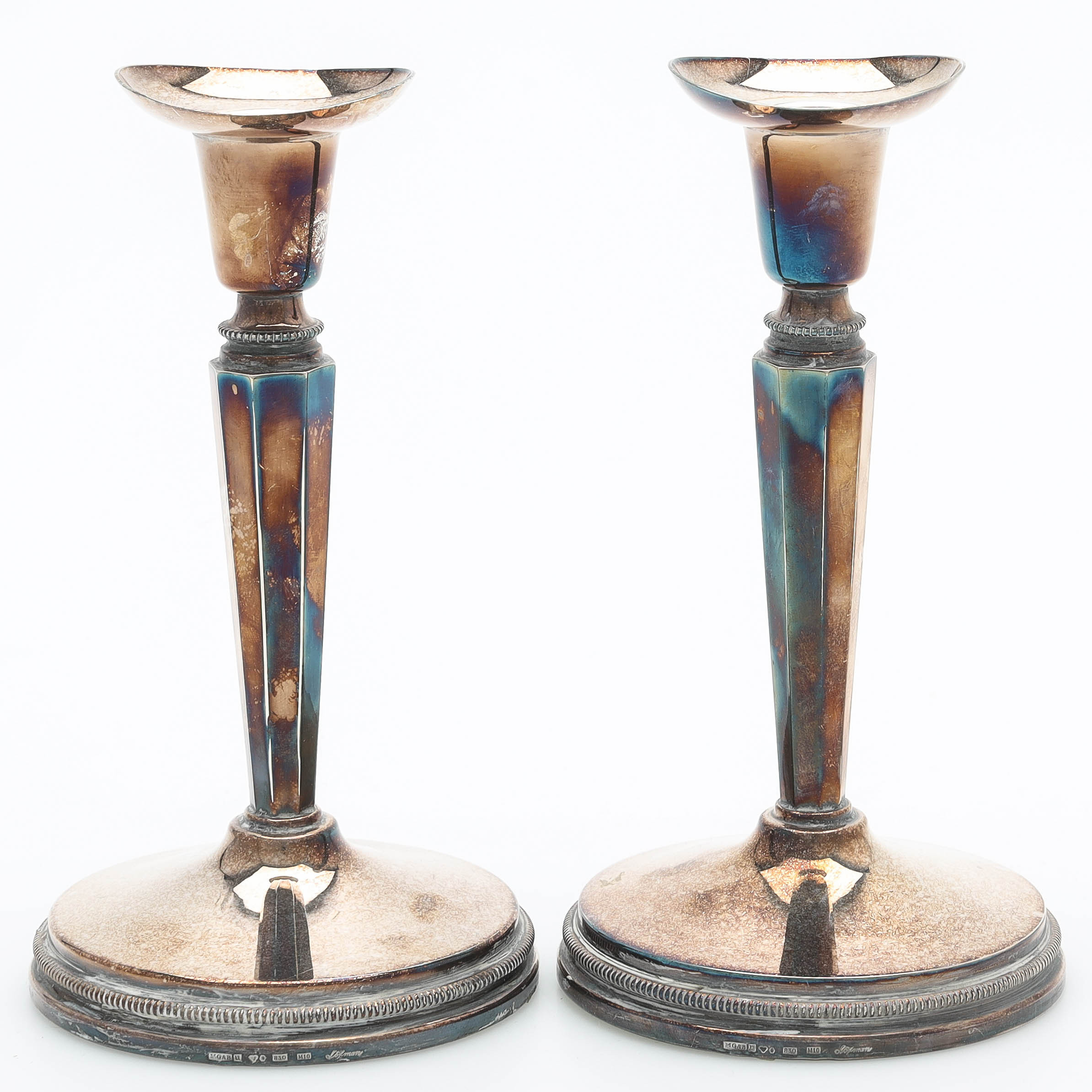 ERIC LÖFMAN. Ljusstakar, ett par, silver, MGAB, Uppsala, 1986.