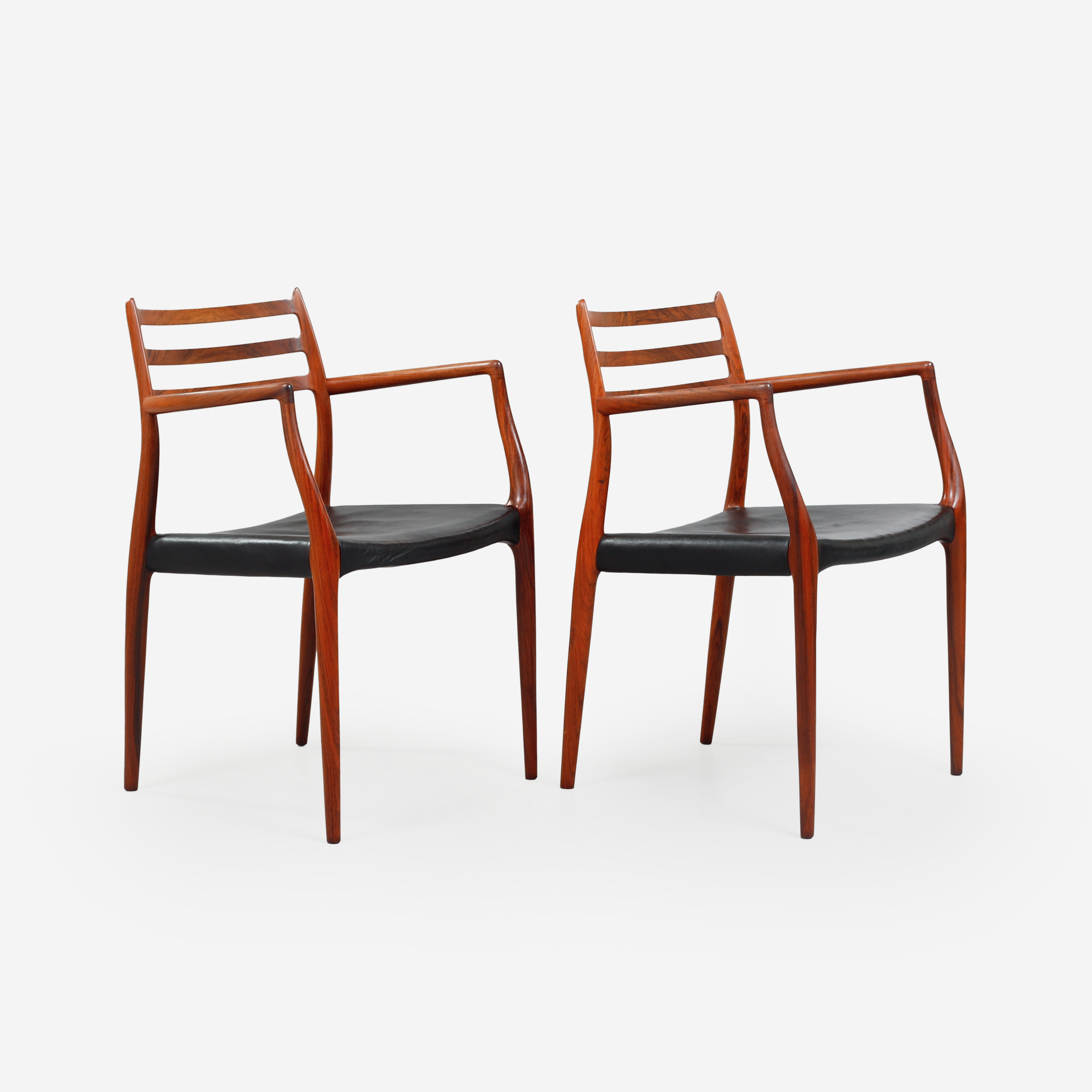 NIELS OTTO MØLLER. Karmstolar, ett par, modell 62, J.L. Møllers Møbelfabrik, Danmark 1960-tal.