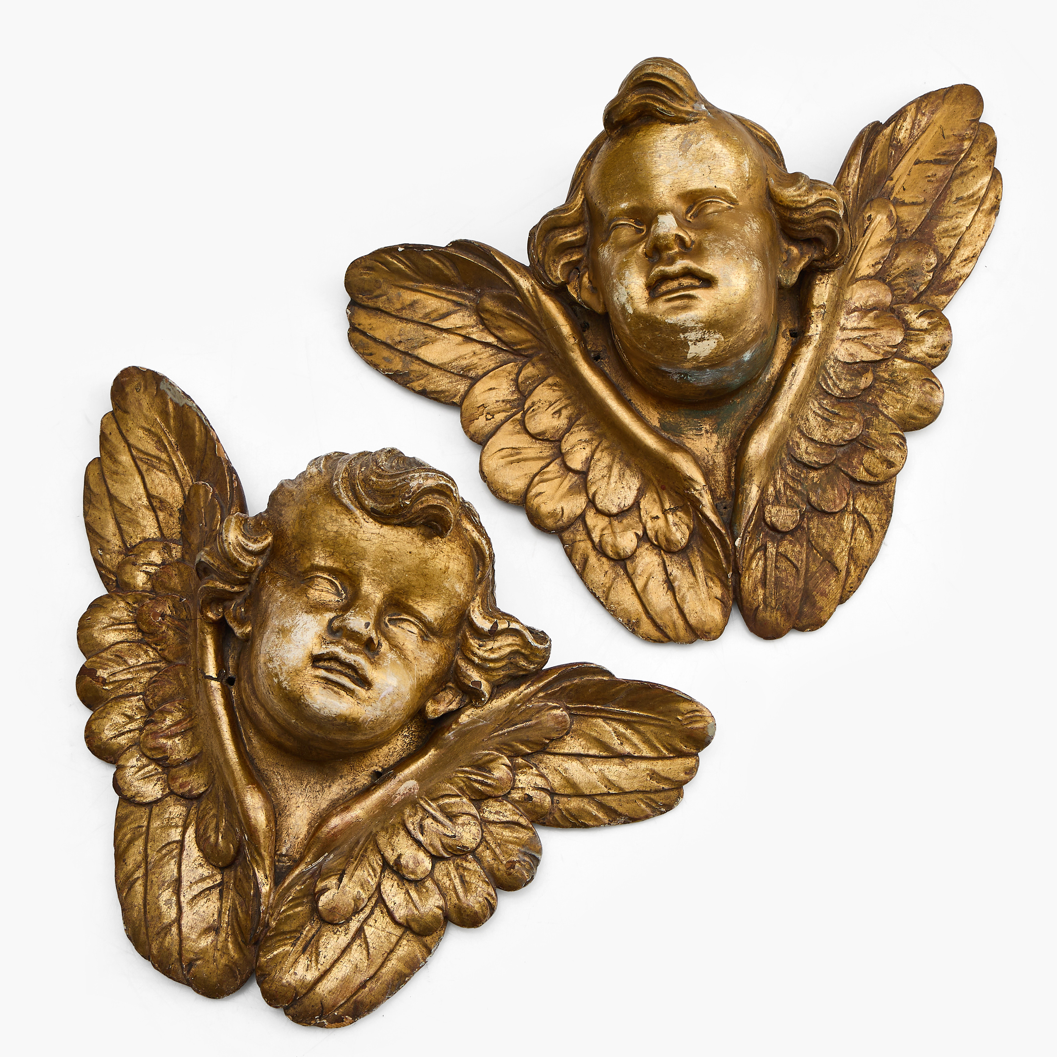 ÄNGLAHUVUDEN/PUTTI, 1 par, skuret och förgyllt trä, 1700-tal.