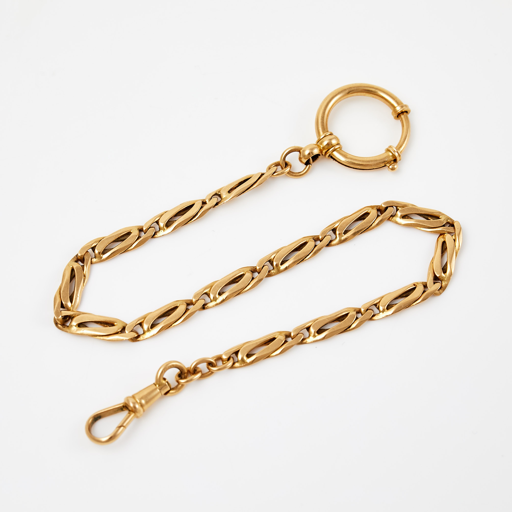 KLOCKKEDJA. 18 k guld, pressad pansarlänk, 1934, svensk kontrollstämpel.