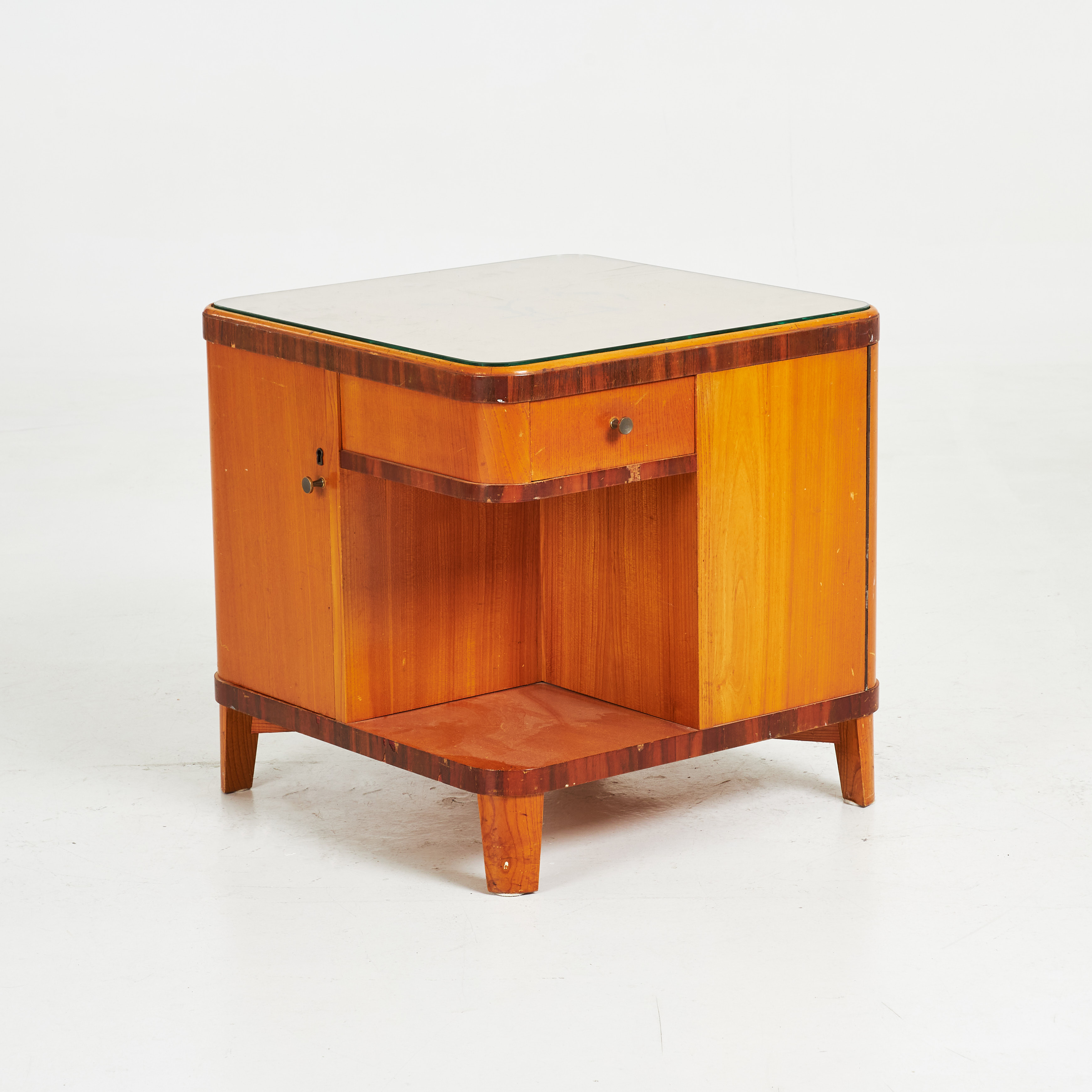 RÖKBORD, fanérad i bl.a. med björk, glasad skiva med intarsiadekor, 2 skåpsdörrar samt 2 lådor, ca 1930-tal.