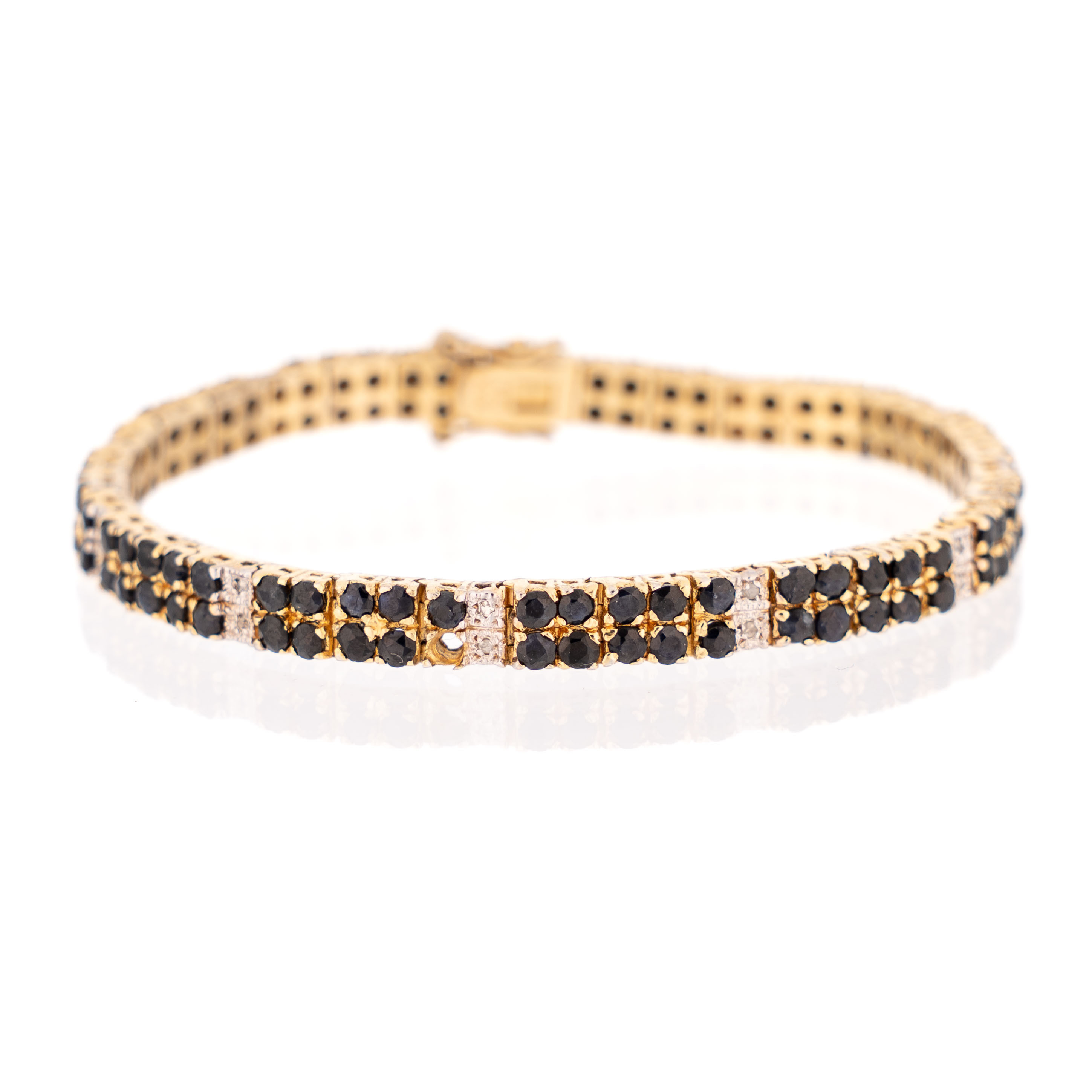ARMBAND. förgyllt silver, med safirer & diamanter 1900-tal.