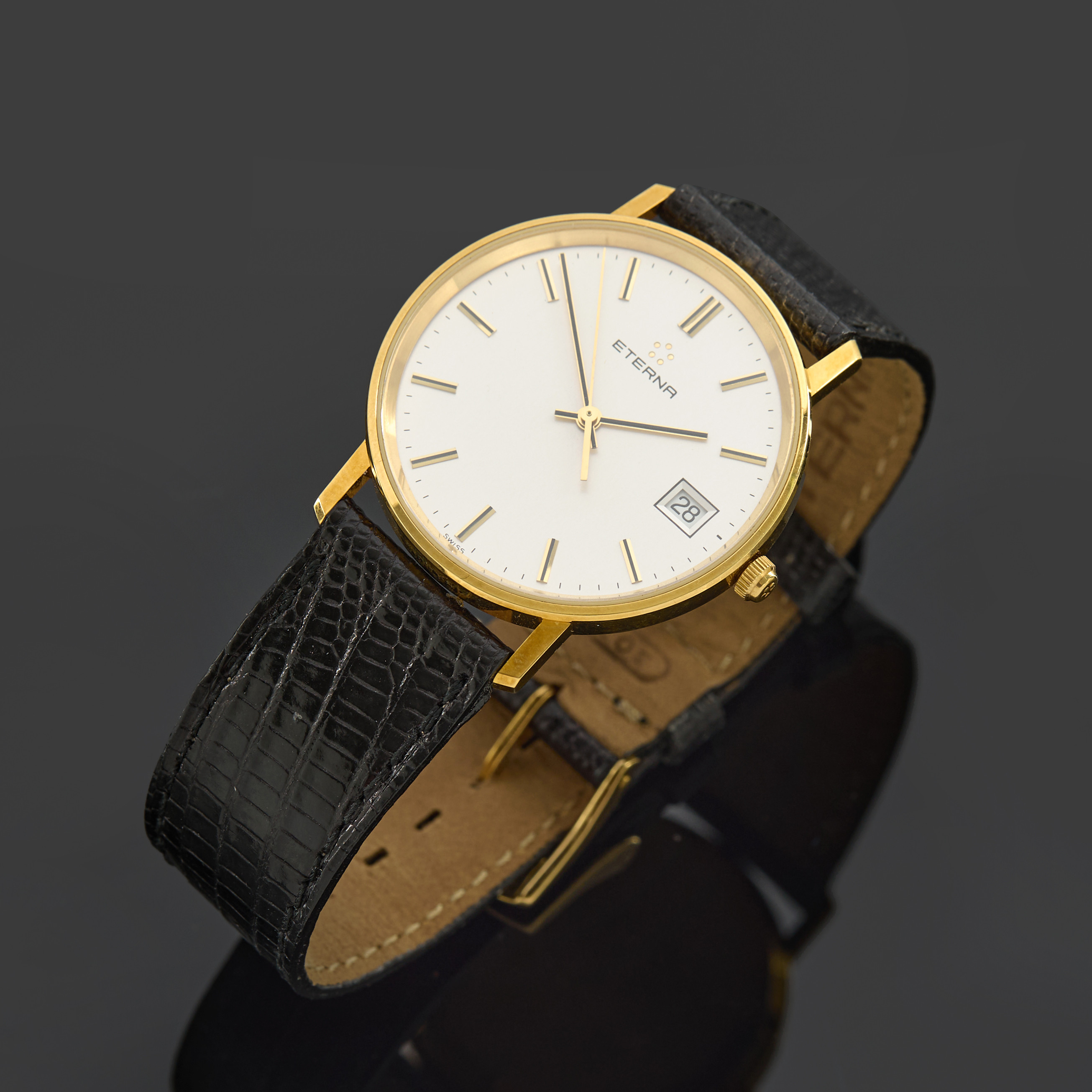 ETERNA. Armbandsur, boett i 18K guld, quartz, datumvisare.