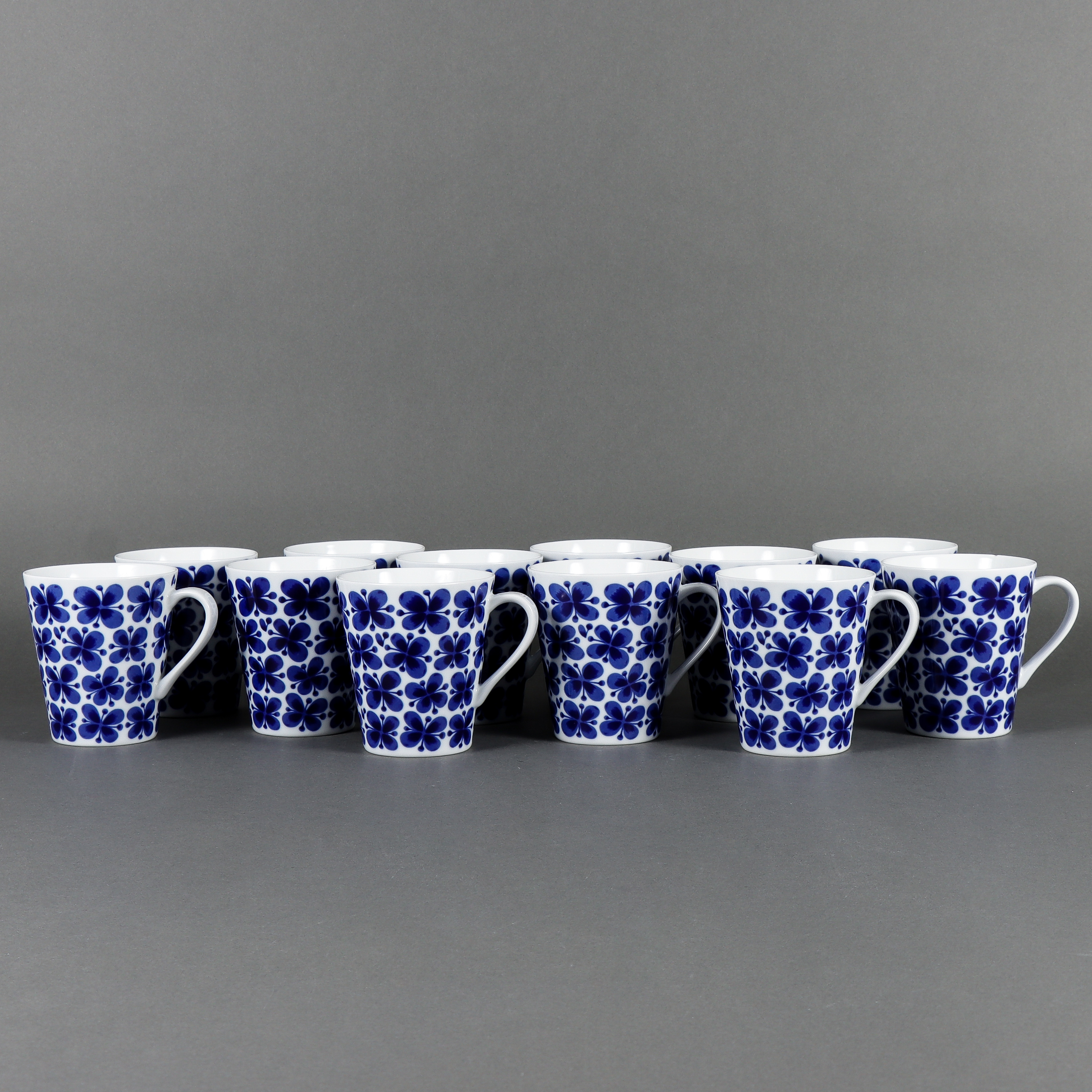 MARIANNE WESTMAN. Muggar 12 stycken, Rörstrand Mon Amie, modern tillverkning.