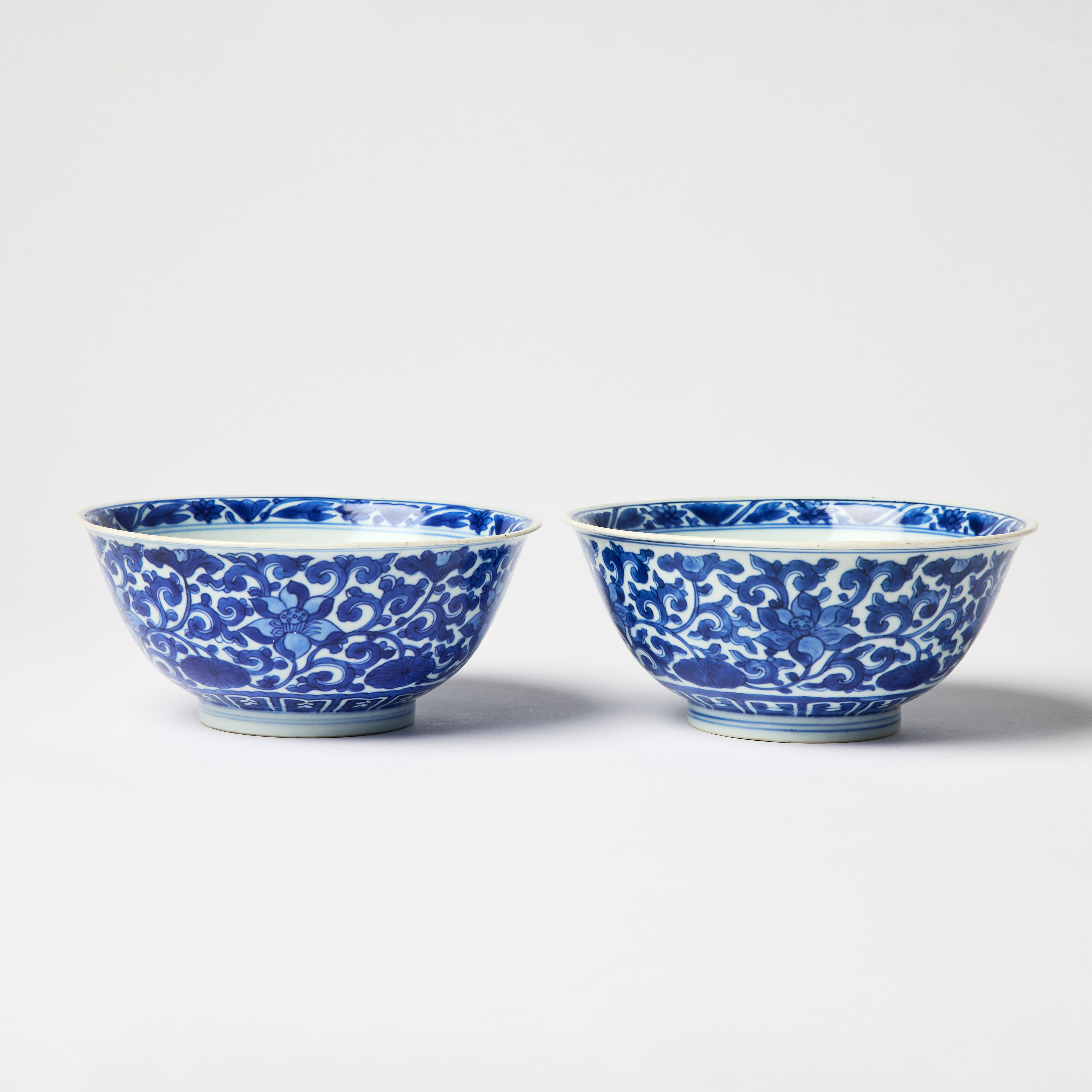 A Pair of Chinese Blue and White 'Lotus' Bowls.
