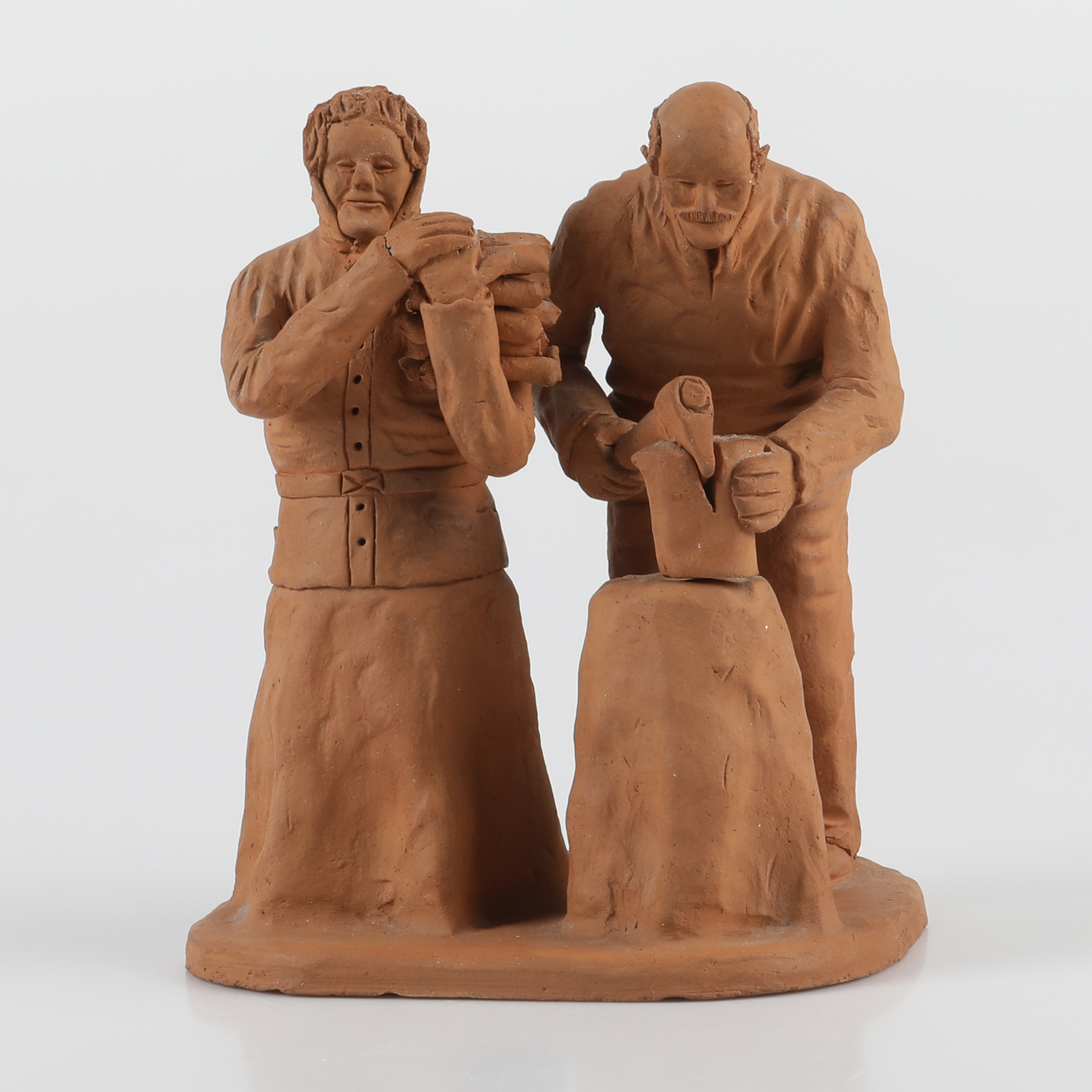 FIGURIN, vedhuggning, lergods, signerad B. Wahl, 1954.