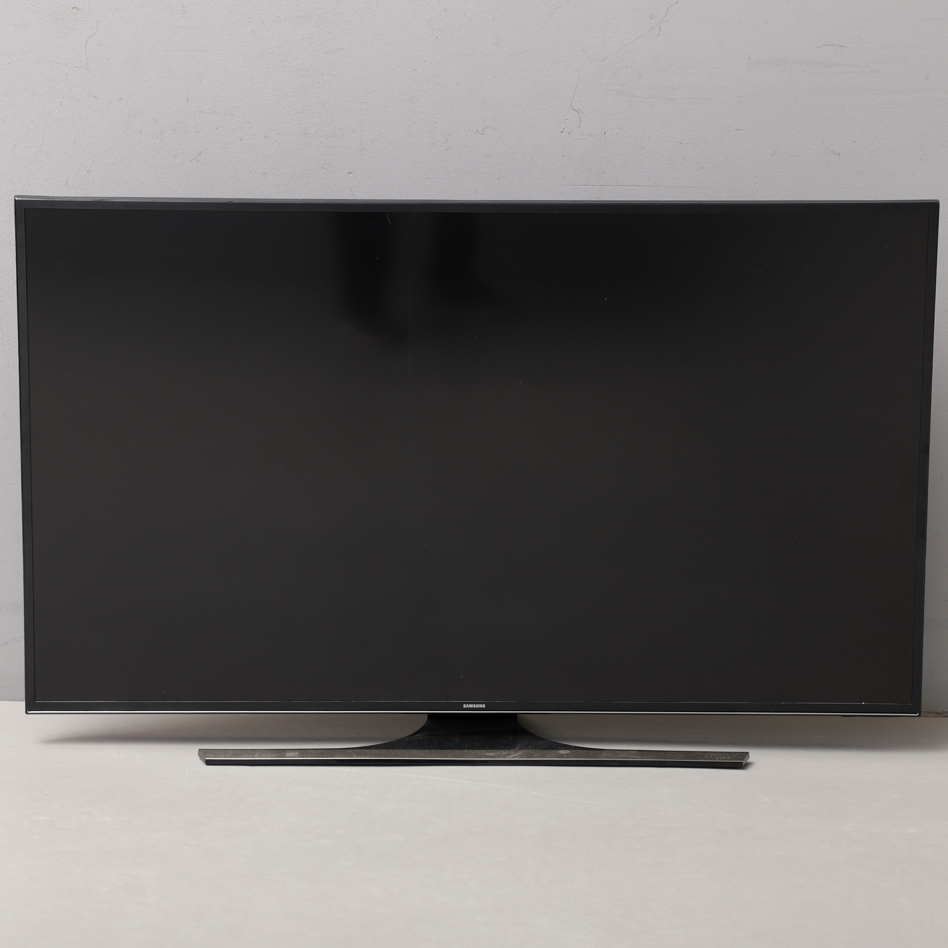 TV, 55", Samsung med fjärrkontroll.