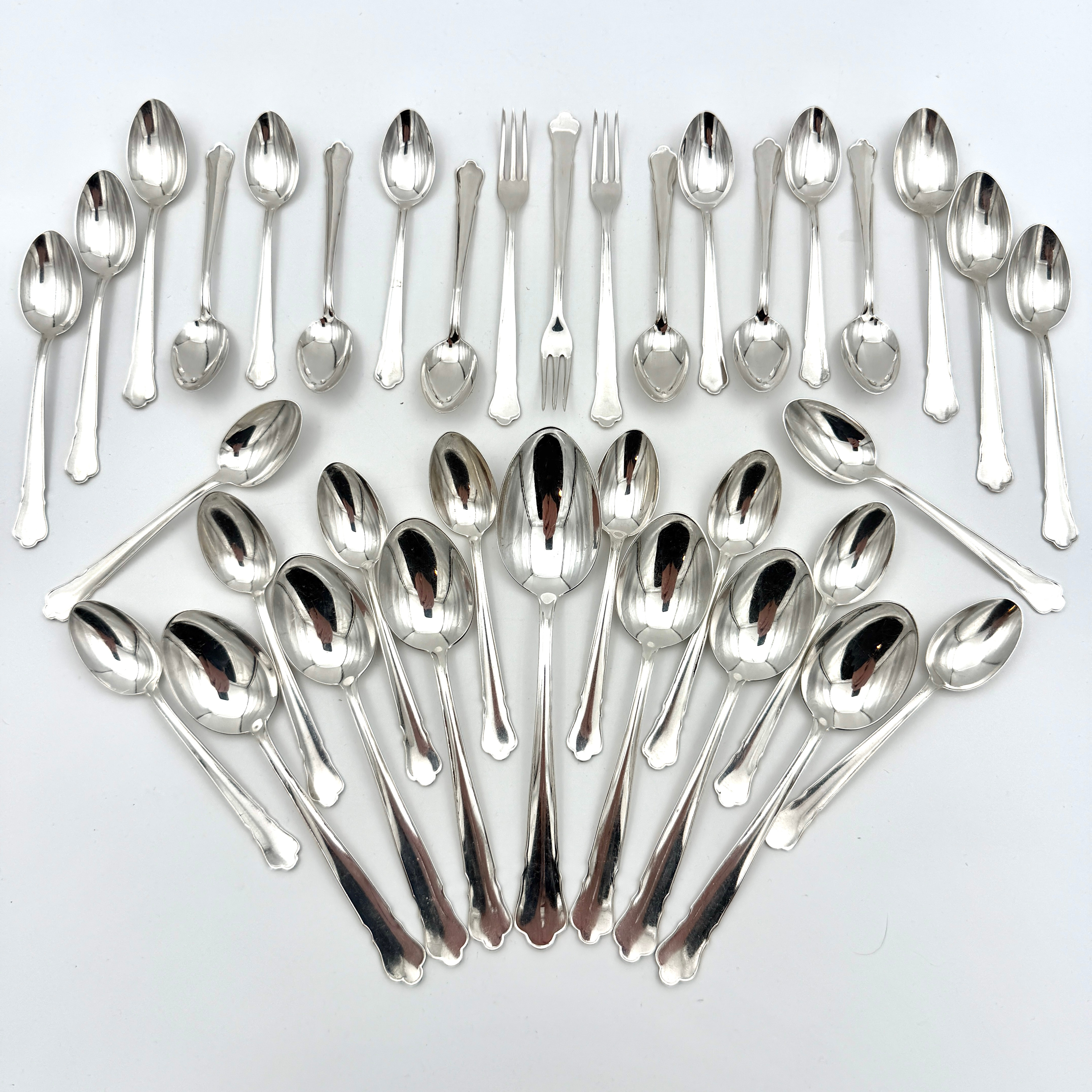 BESTICK, 36 dlr, silver, modell Chippendale, stämplade för GAB, Stockholm, ca 1940-50-tal, total vikt ca 550 gr.