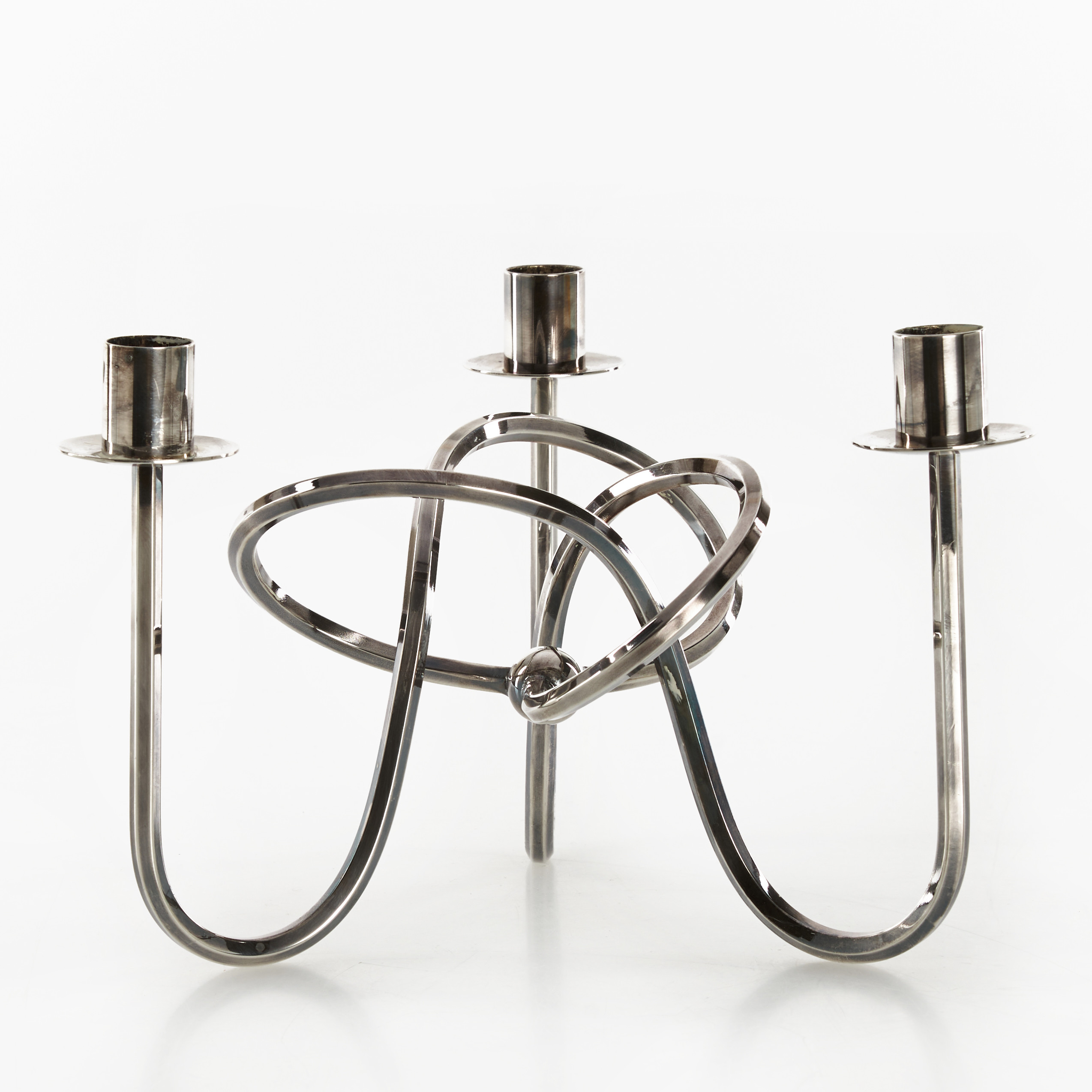 JOSEF FRANK (1885–1967). Kandelaber "Vänskapsknuten", försilvrad mässing, Firma Svenskt Tenn.