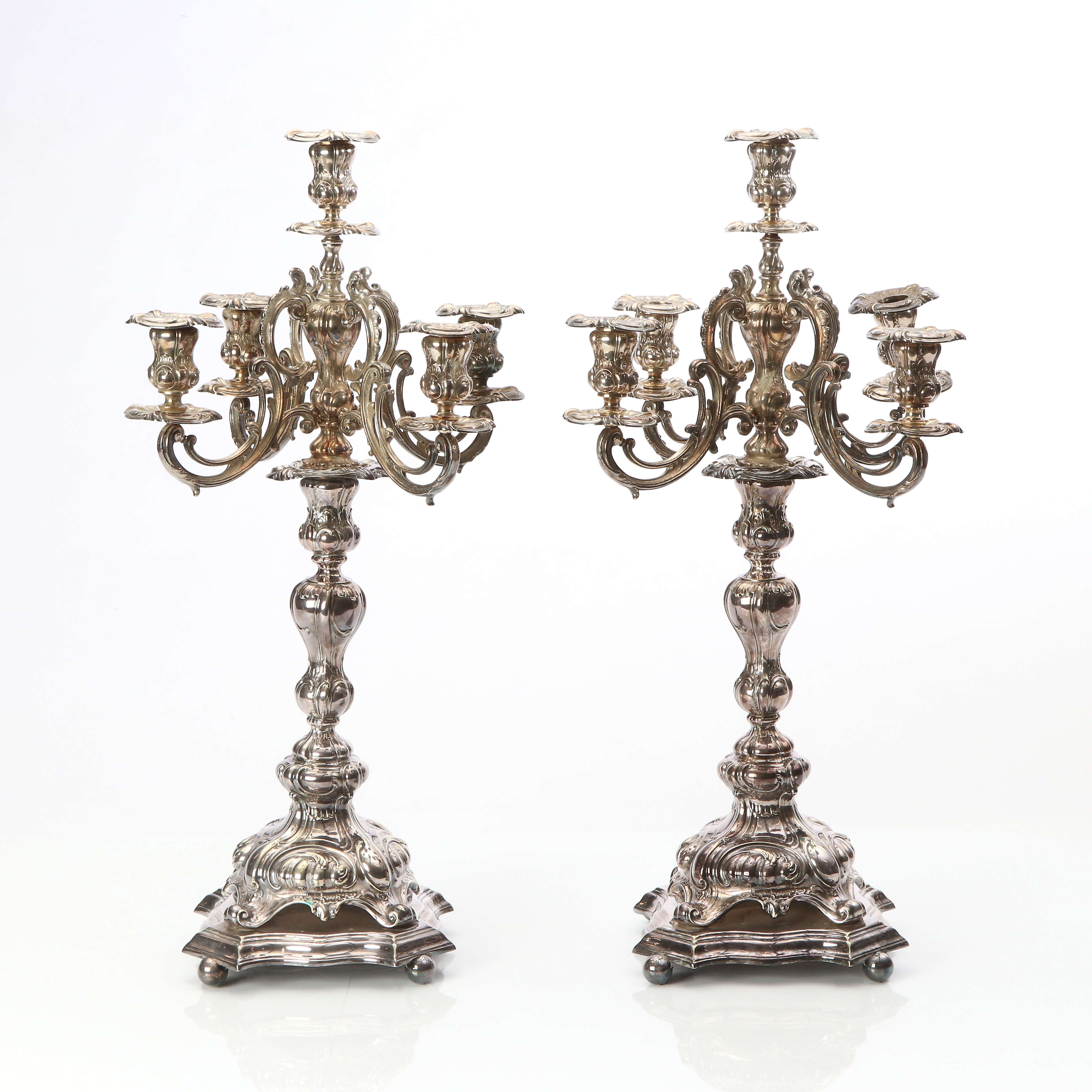 CARL ROBERT CARLSTRÖM. KANDELABRAR, ETT PAR. Nysilver. Nyrokoko, omkring år 1900.