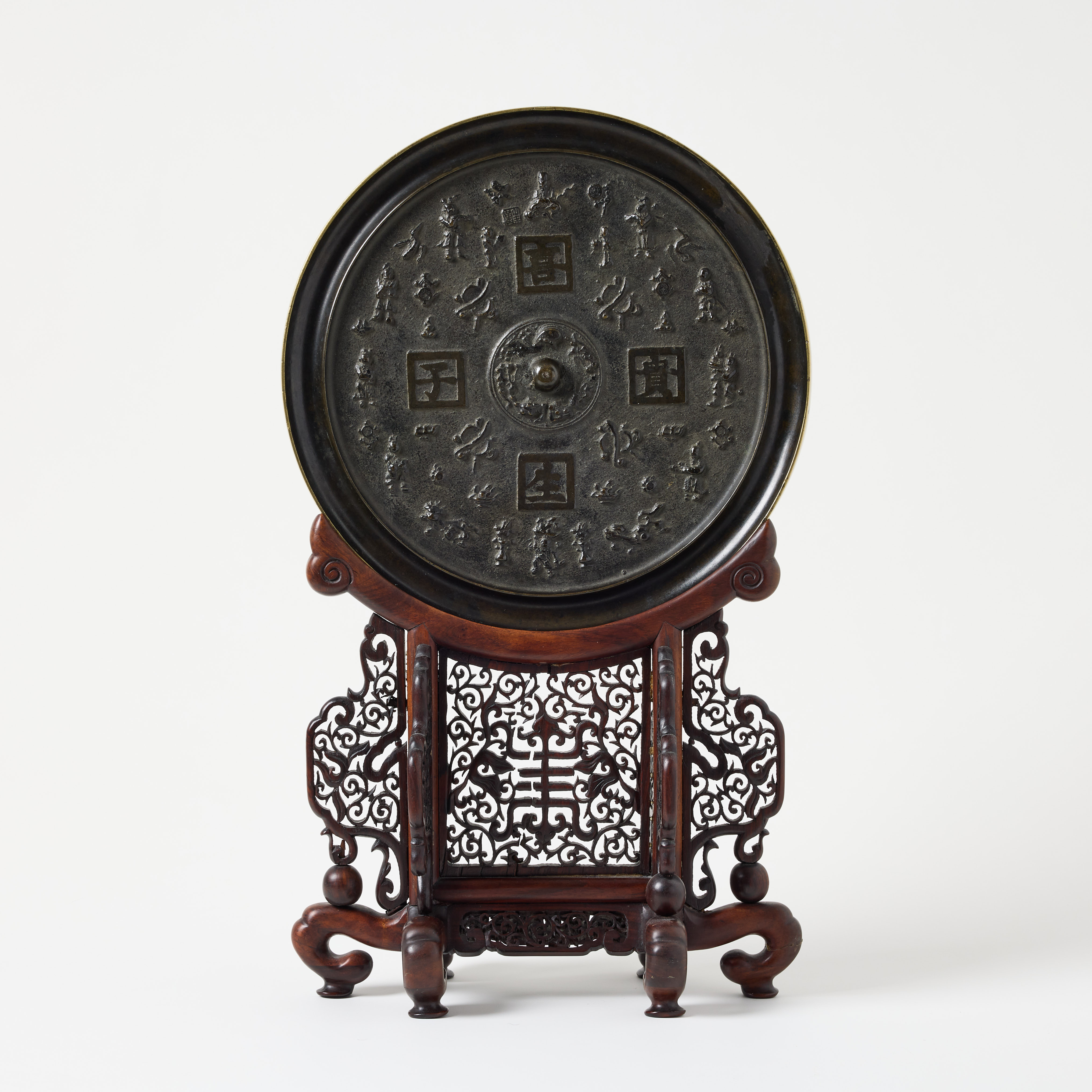 A Large Chinese Bronze Mirror.