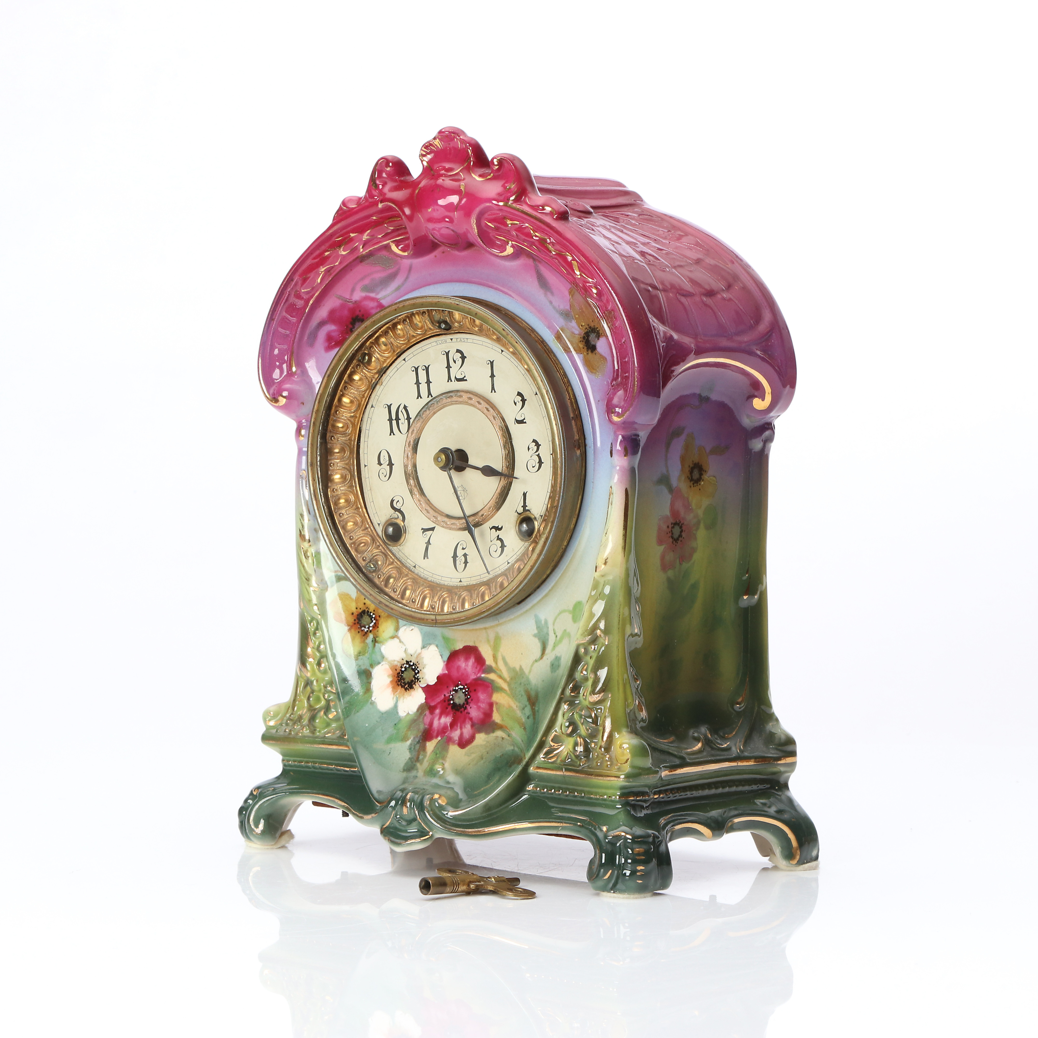 BORDSPENDYL. Anson Clock Co, New York, fodralet i porslin märkt Royal Bonn, Germany.