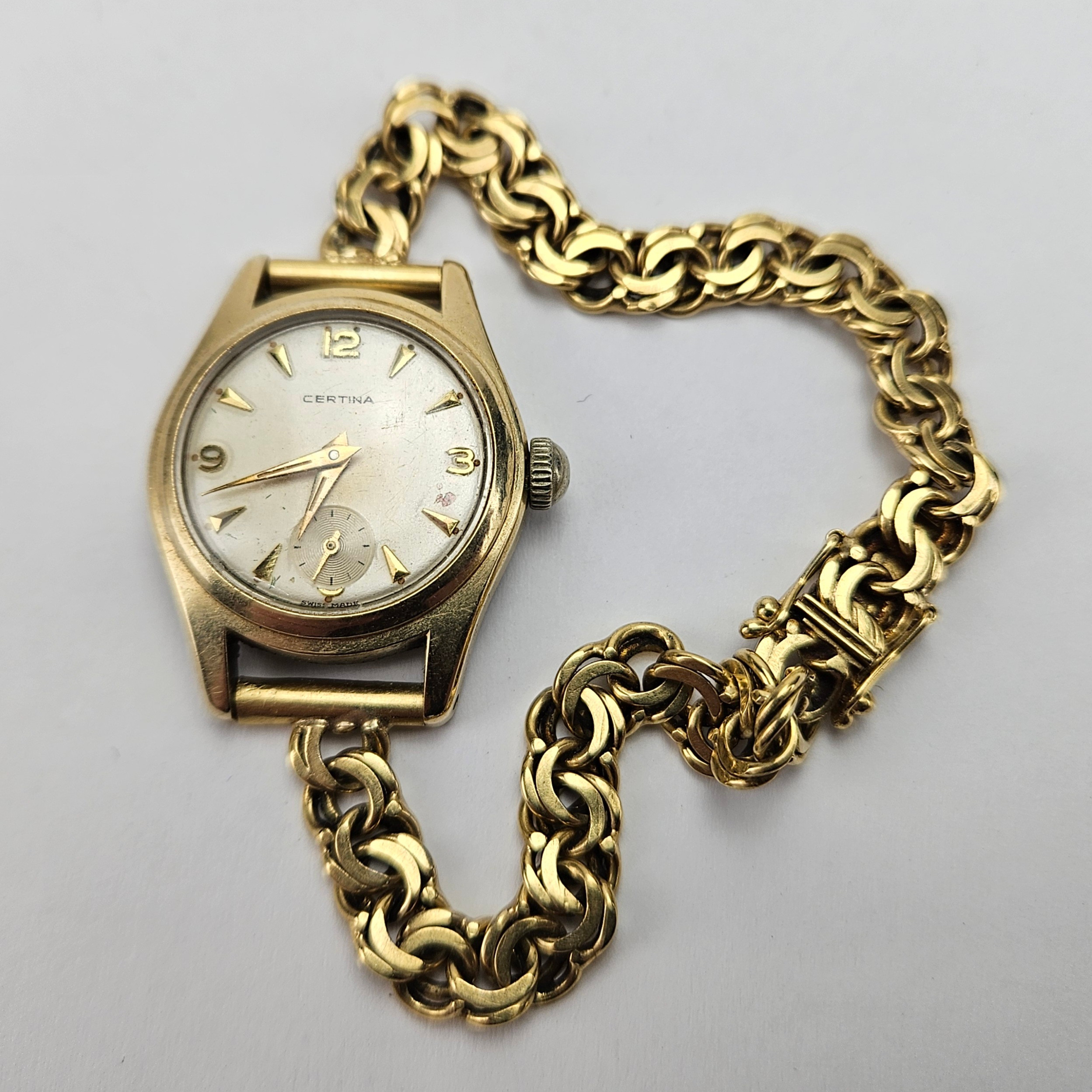 ARMBANDSUR, stål, Certina med ARMBAND, "Bismarck", guld, 18K, total vikt inklusive ur, ca. 30,1 gram.
