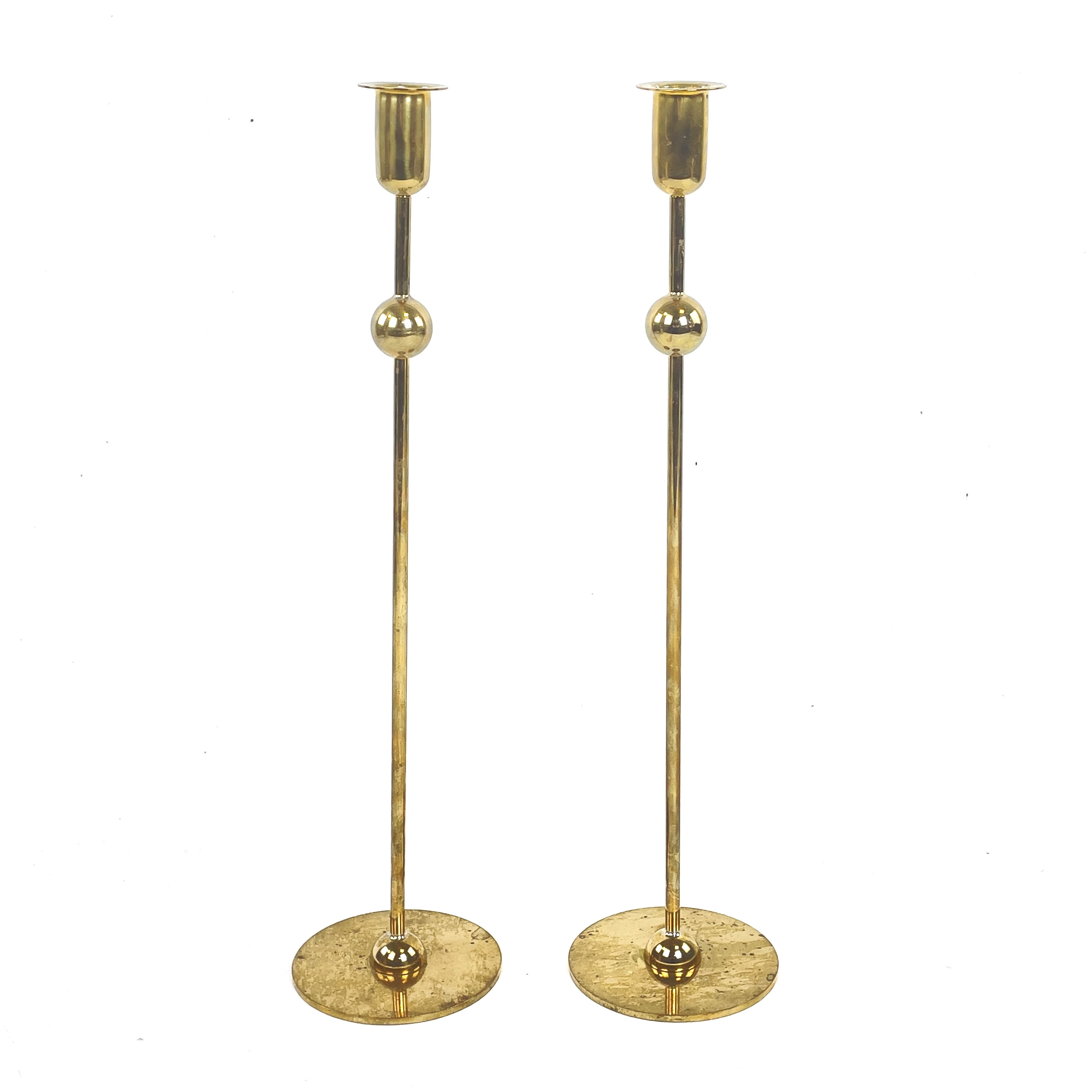 ESTRID ERICSON. Ljusstakar, ett par. "Kulan", mässing, Firma Svenskt Tenn.