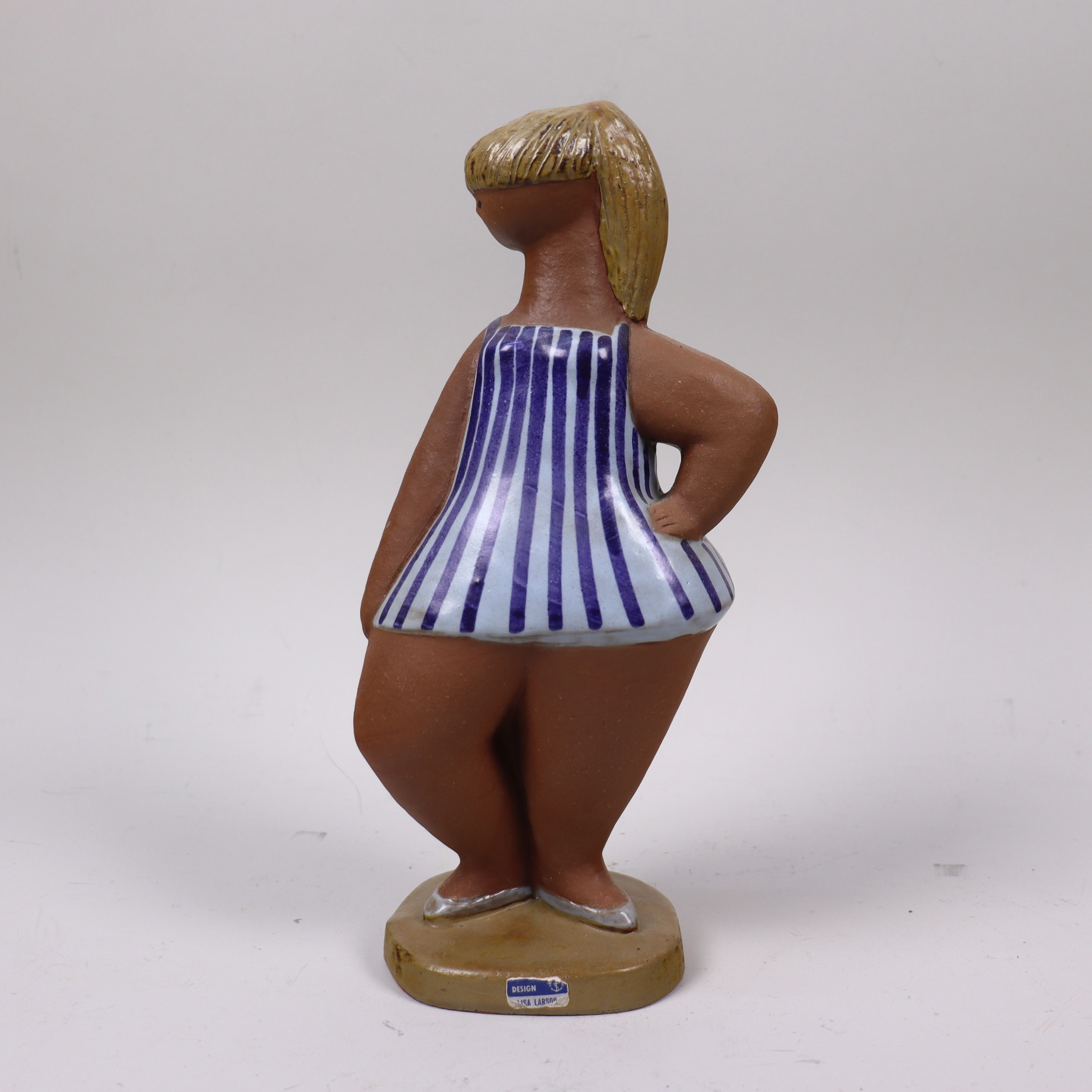LISA LARSON. "Dora", ur serien "ABC-flickorna", figurin i stengods, Gustavsberg.