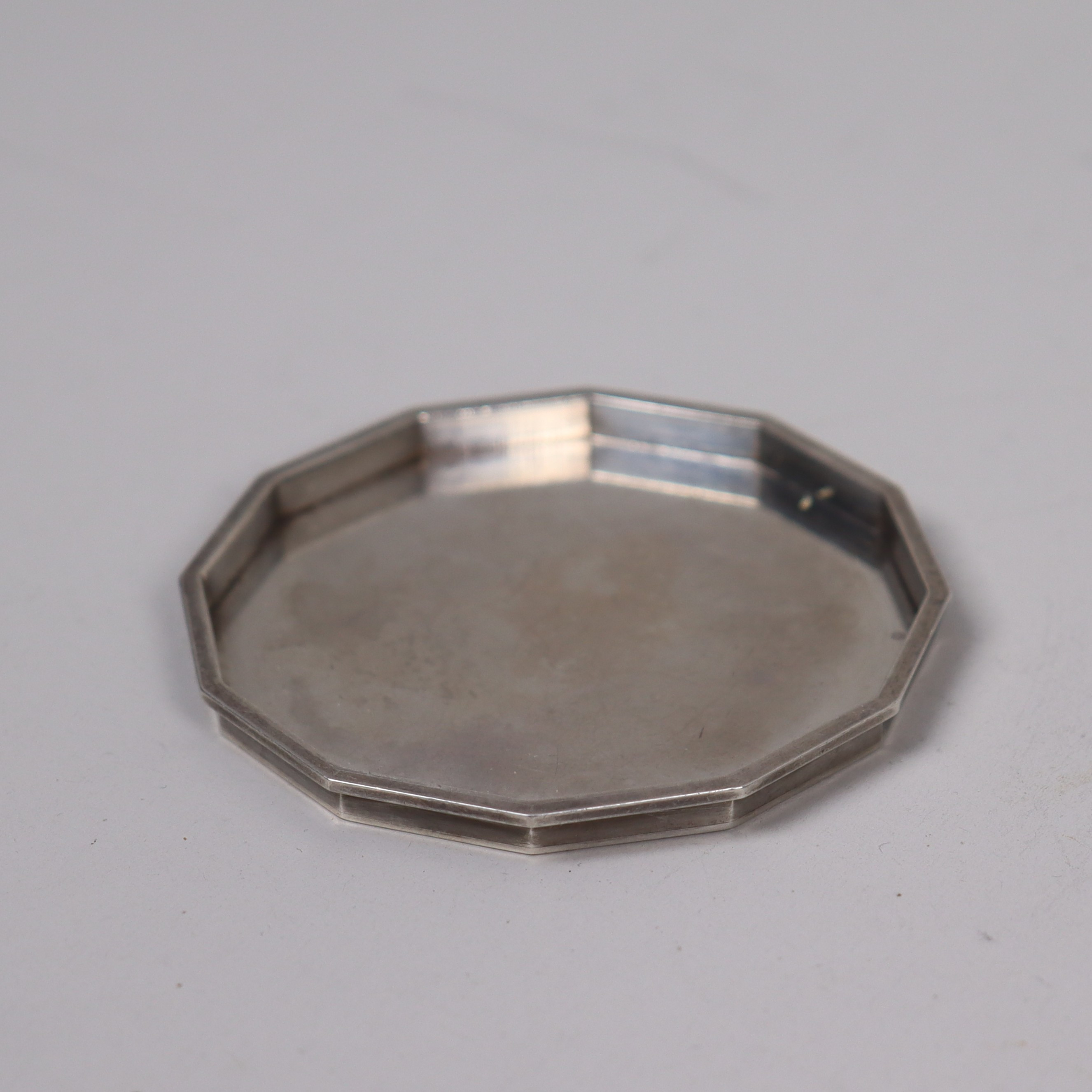 WIWEN NILSSON. coaster, sterling silver, Lund, 1943.