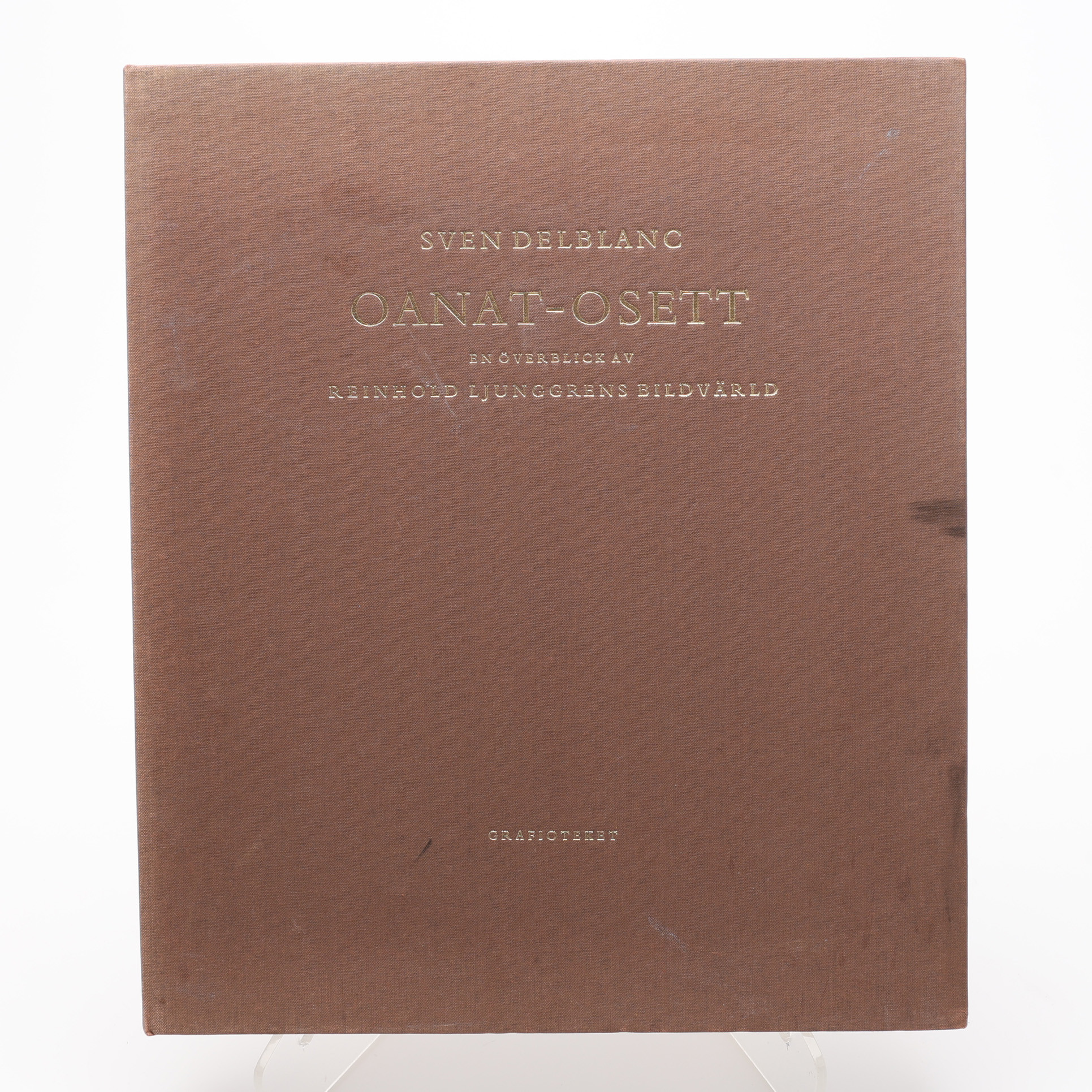 BIBLIOFILI. SVEN DELBLANC'S OANAT-OSETT OM REINHOLD LJUNGGRENS KONST MED SIGNERAD FÄRGLITOGRAFI. - NR 21 AV 400 EXEMPLAR.