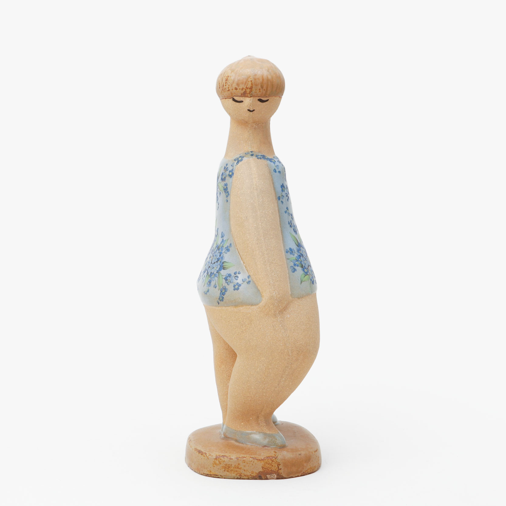 LISA LARSON. Figurin "Dora", delvis glaserat stengods med cromotryck, Gustavsberg.