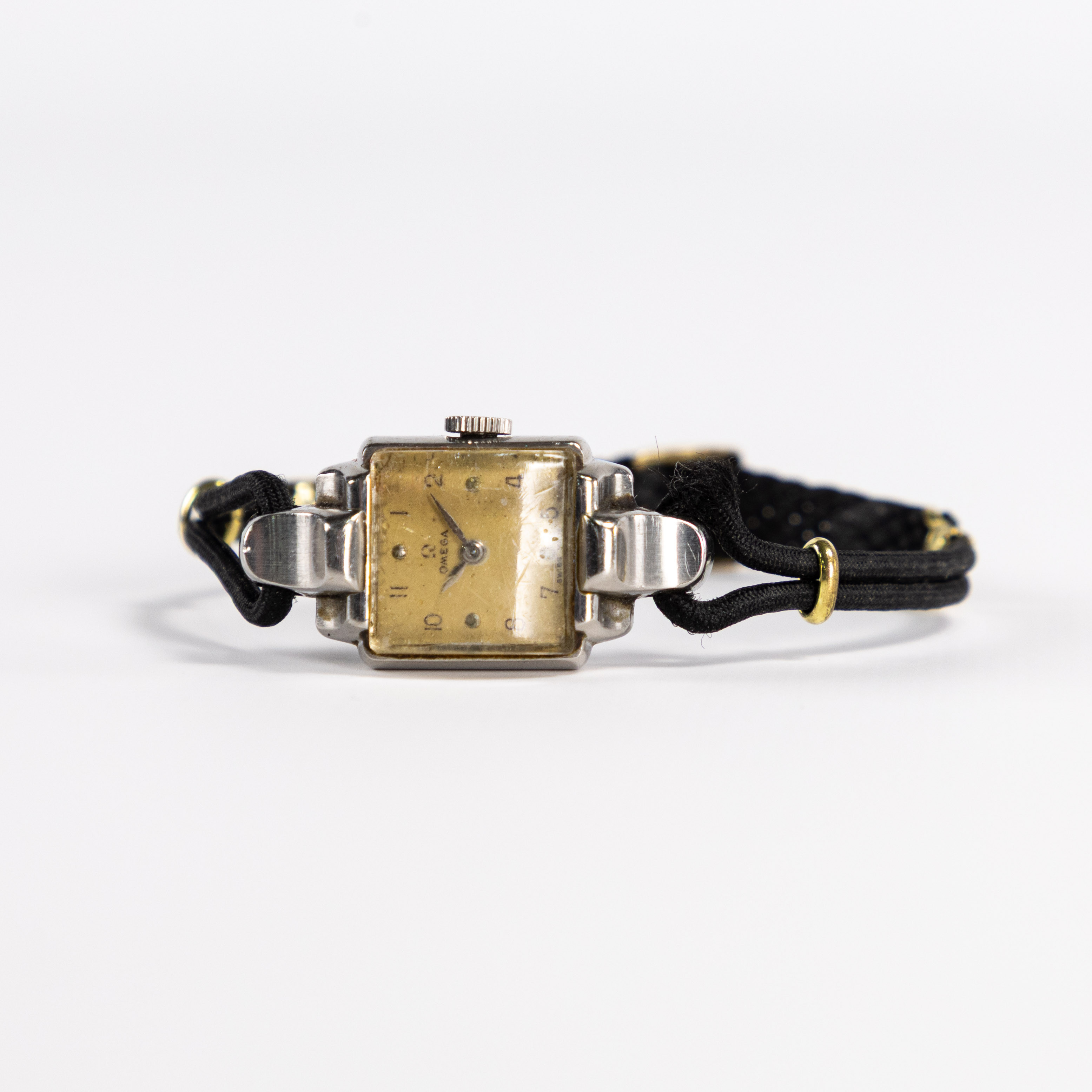 OMEGA. 16 mm, rostfritt stål, 50-tal.