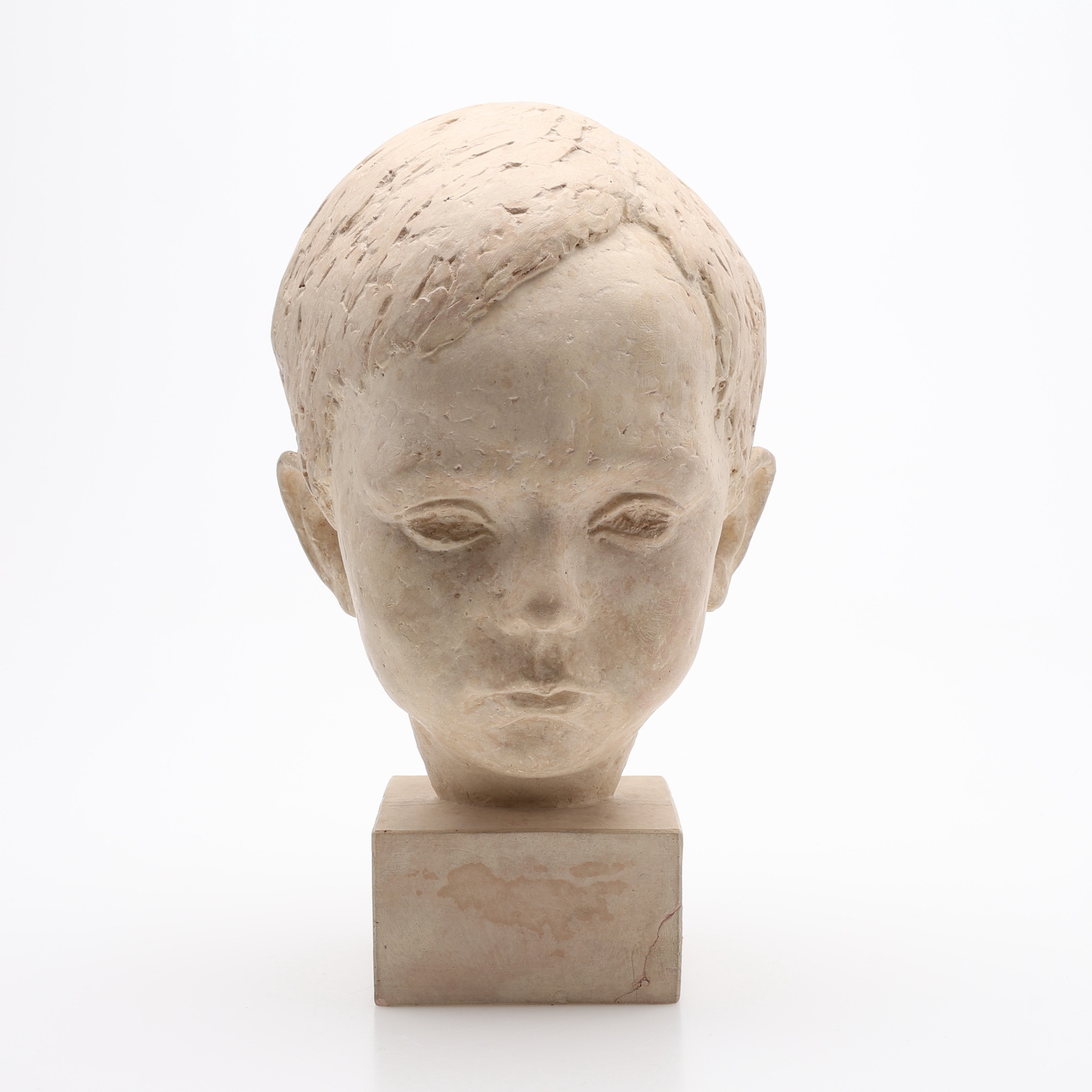 FRED ÅBERG (1947-). SKULPTUR, I FORM AV GOSSHUVUD, STENMASSA, MONOGRAMSIGNERAD & NUMRERAD 6/8.