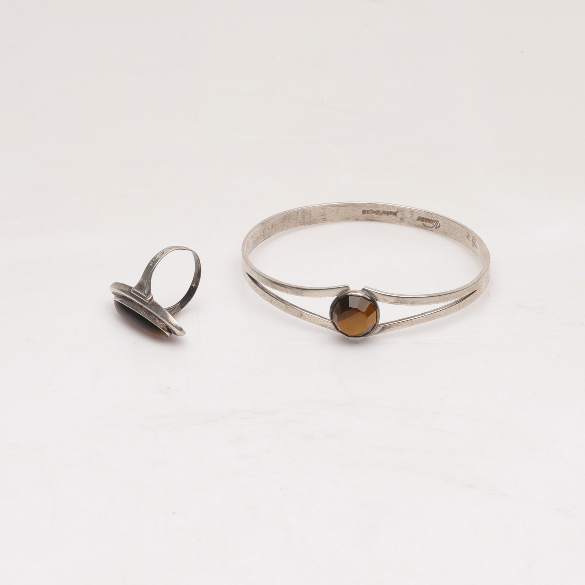 RING OCH ARMBAND, set, silver och tigeröga, Victor Janson, "Vicson", Lindesberg 1968.