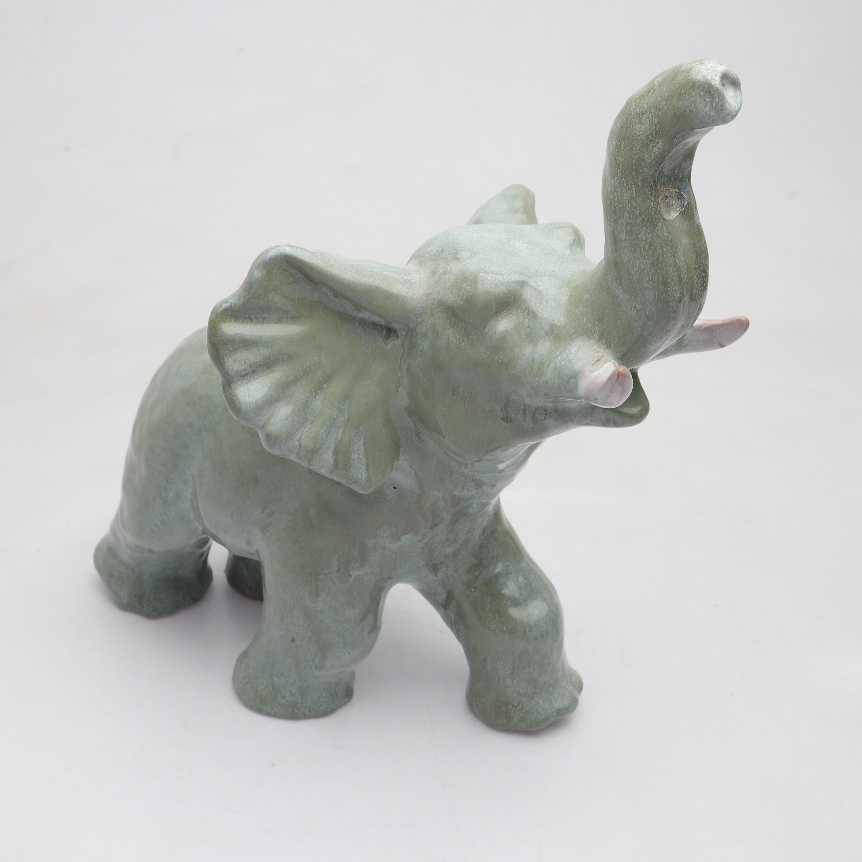 VICKE LINDSTRAND. figurin, glaserat lergods, Upsala-Ekeby, omkring 1900-talets mitt.