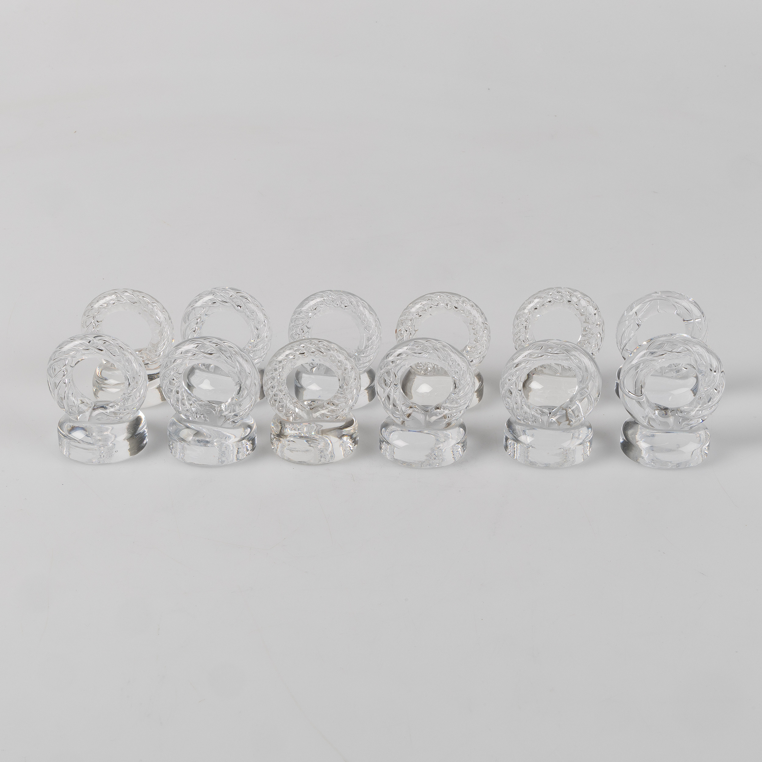 EKENÄS GLASBRUK, 12 servettringar i glas, 1970-tal.