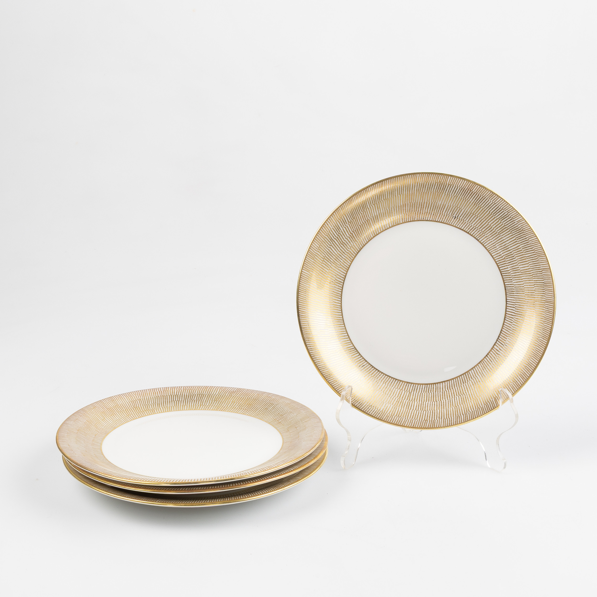 SIGNE PERSSON-MELIN. Assietter, 'Primeur', guld, 4 st. Rörstrand.