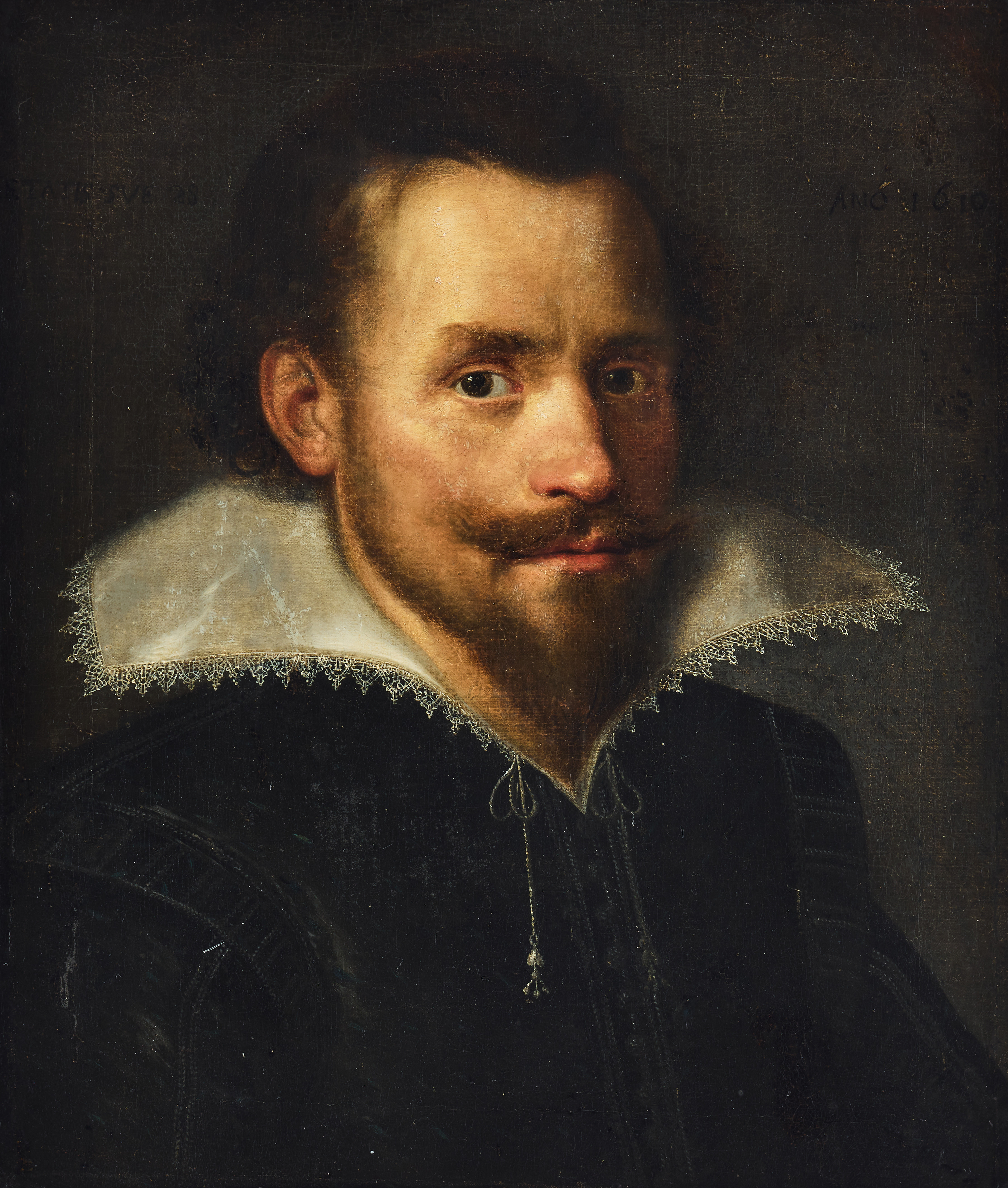 PRAGUE SCHOOL, 1610. Portrait of a man in a black jacket with white lace collar.