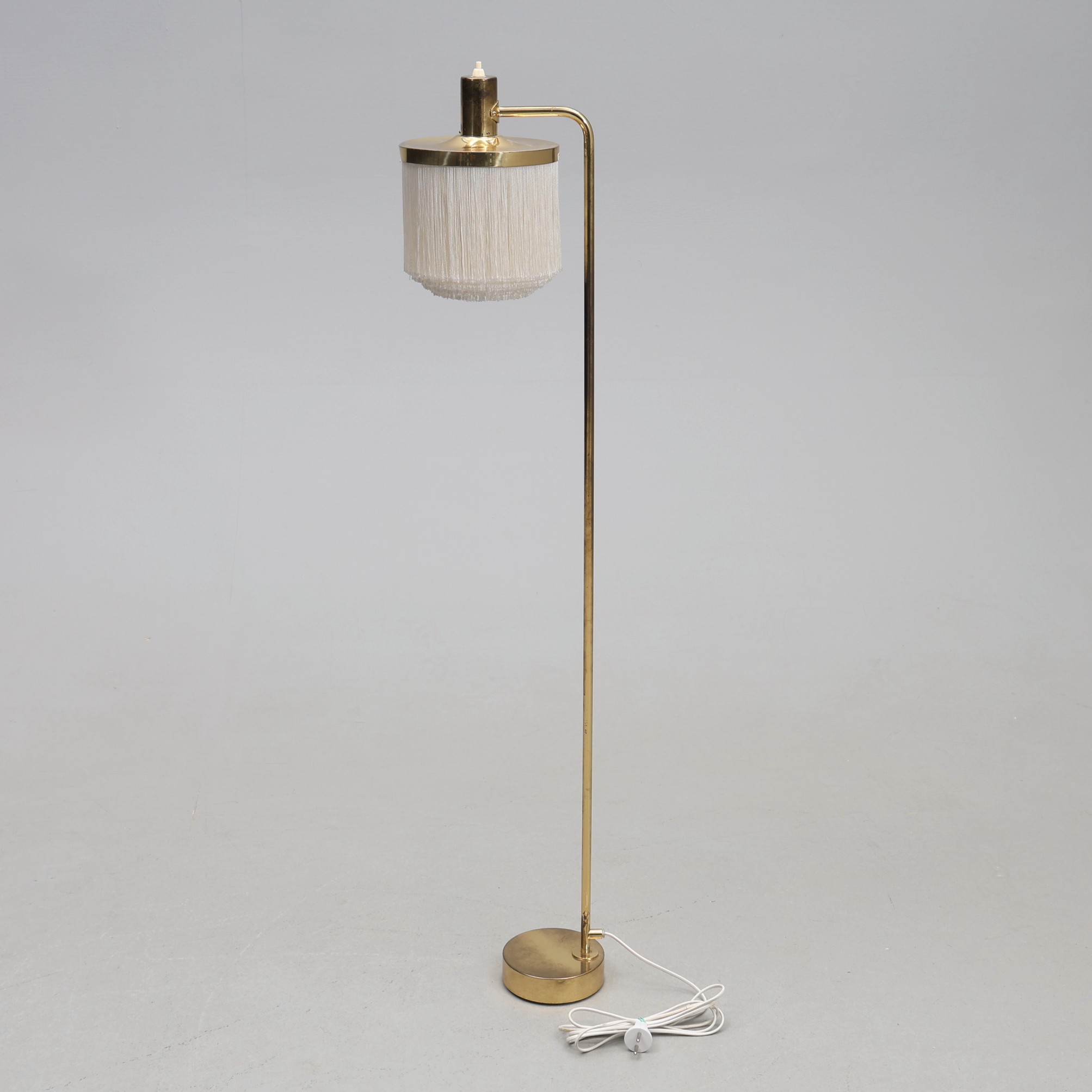 HANS-AGNE JAKOBSSON. Golvlampa, "G109", mässing / fransar, Markaryd, 1960-tal.
