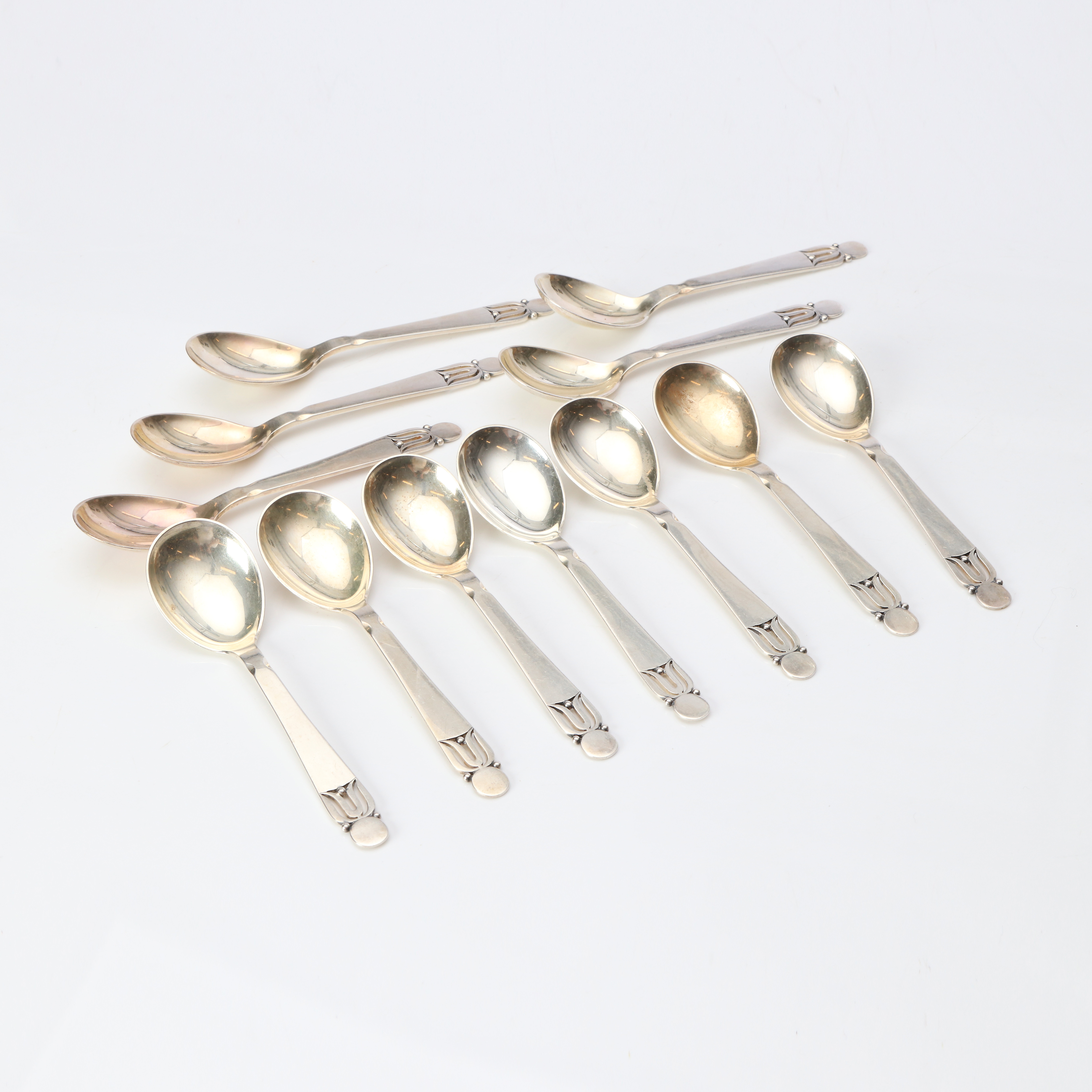 MOGENS BJØRN ANDERSEN. SKEDAR, 12 ST. Sterlingsilver. Birkeröd, Danmark, 1900-tal. Vikt ca 350 gram.