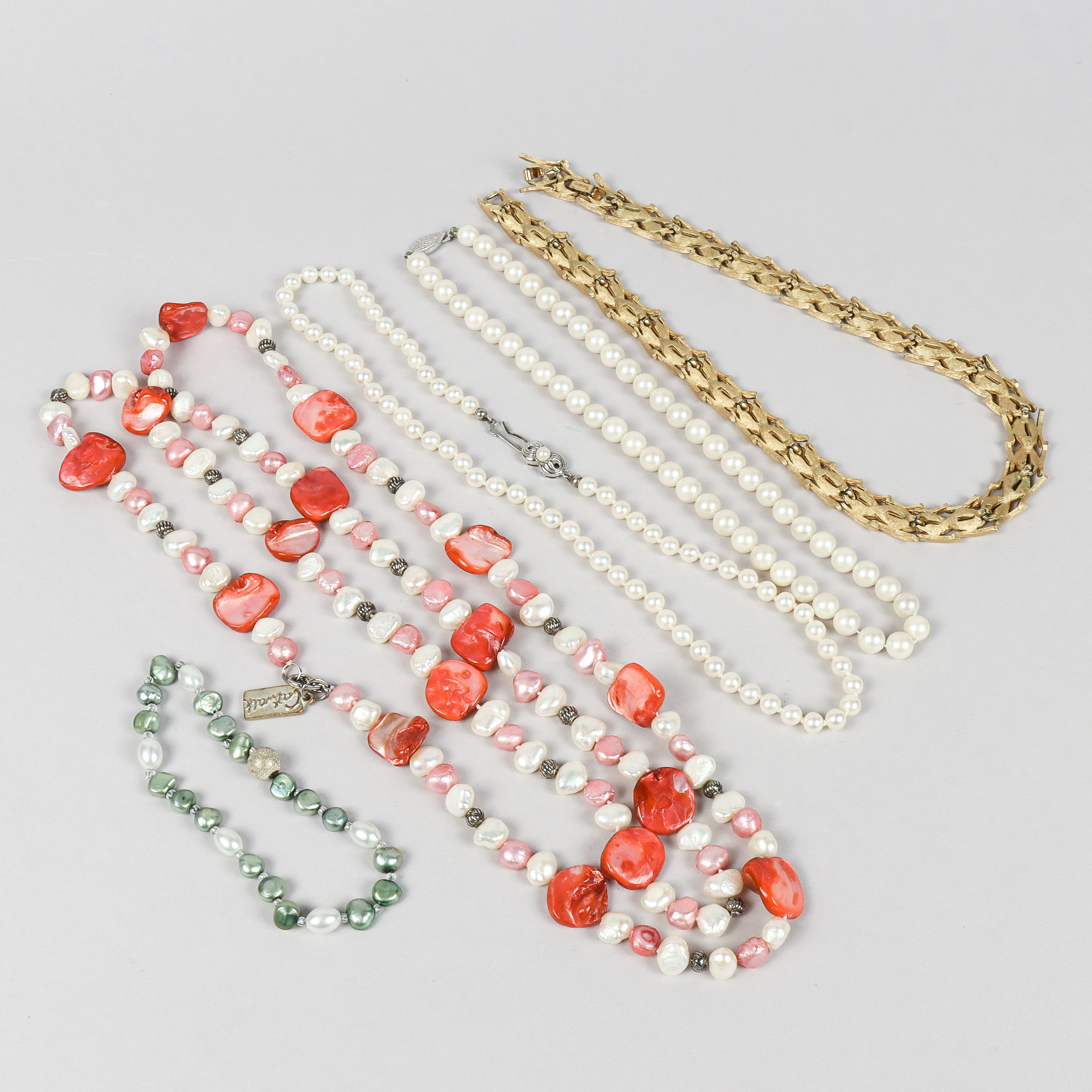SMYCKEN, collier och armband.