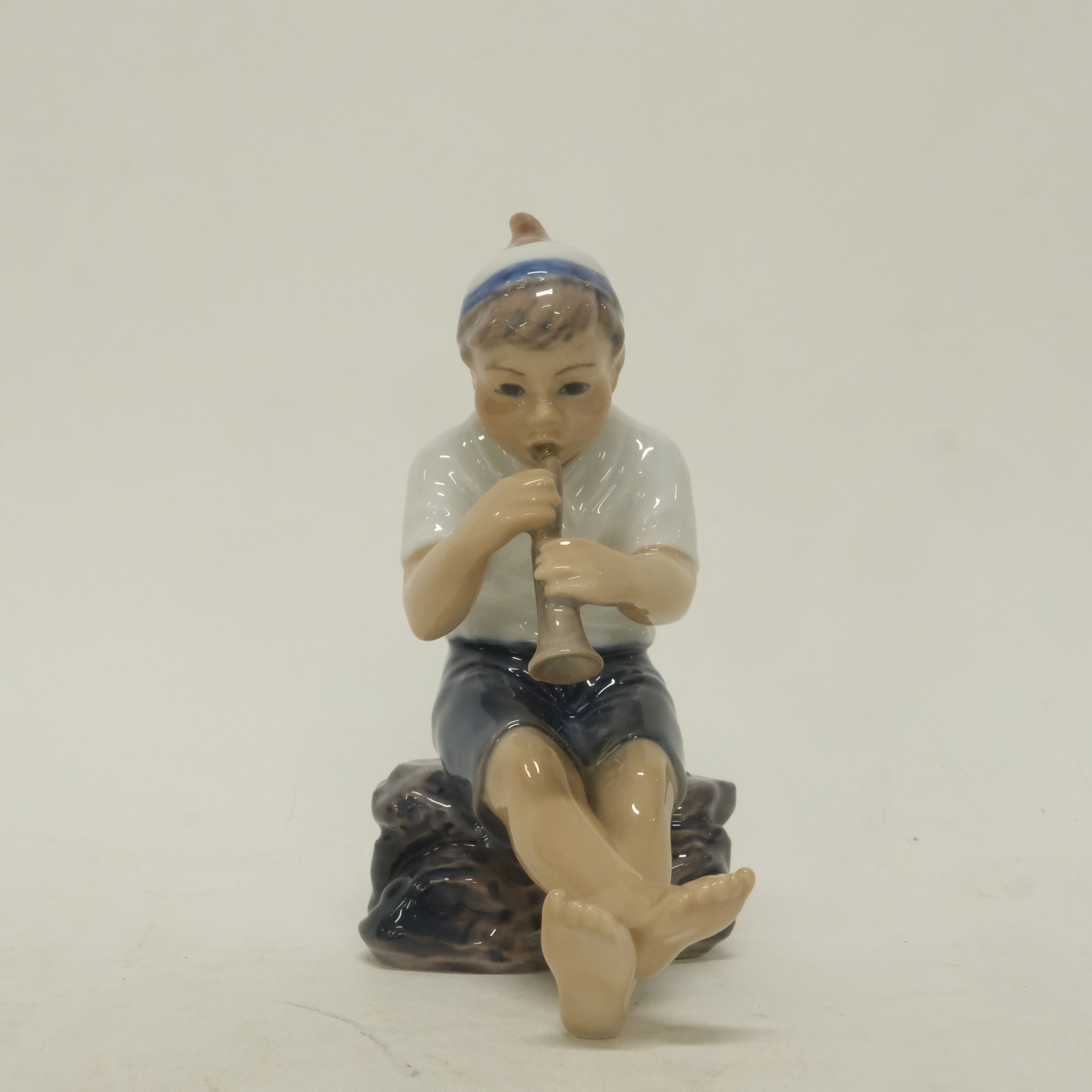 DAHL JENSEN. FIGURIN, POJKE MED TRUMPET.